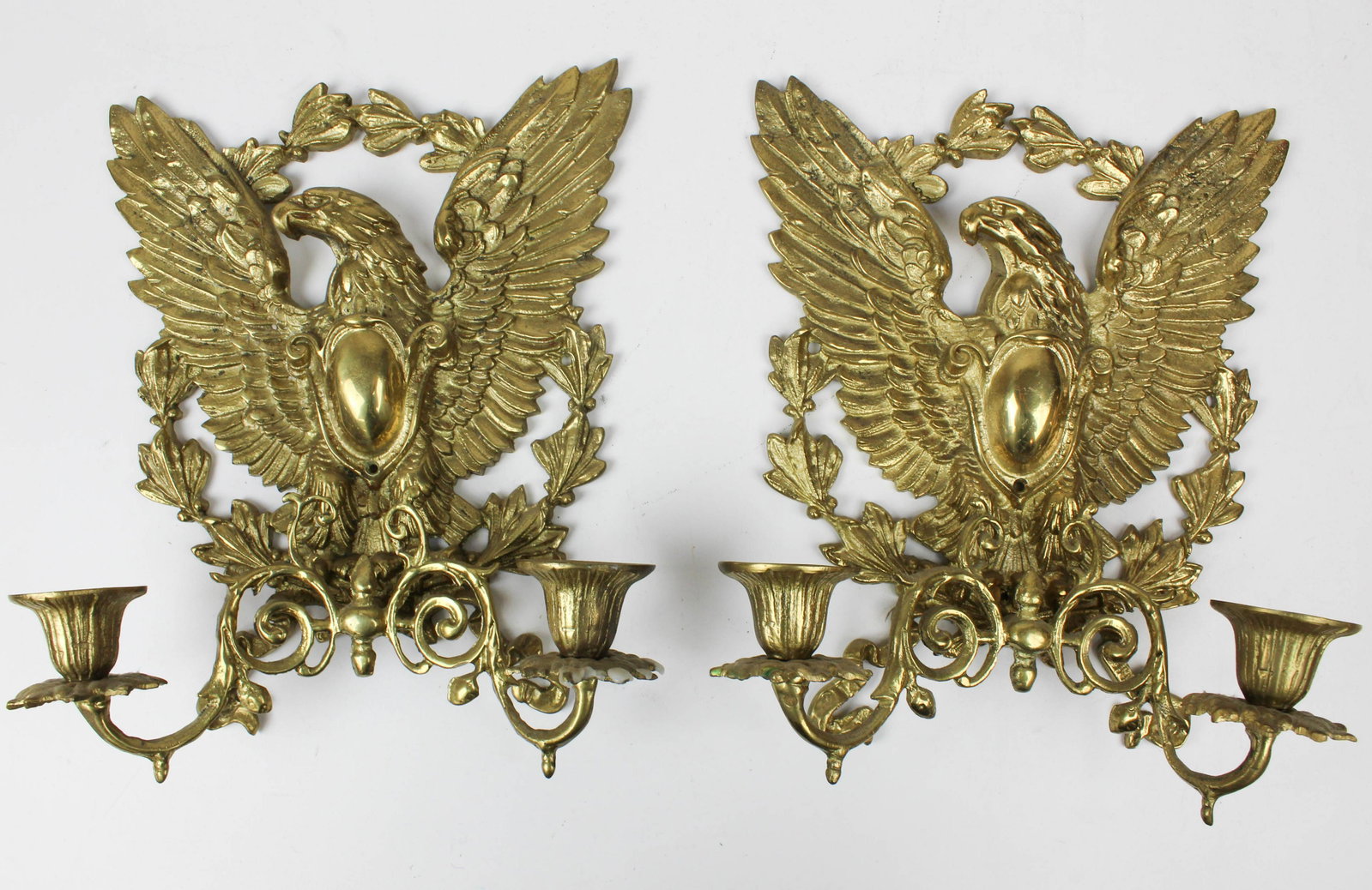 20th c Brass Eagle Candle Sconces: Pair of mid 20th c brass eagle candle sconces, ht 13 1/2"