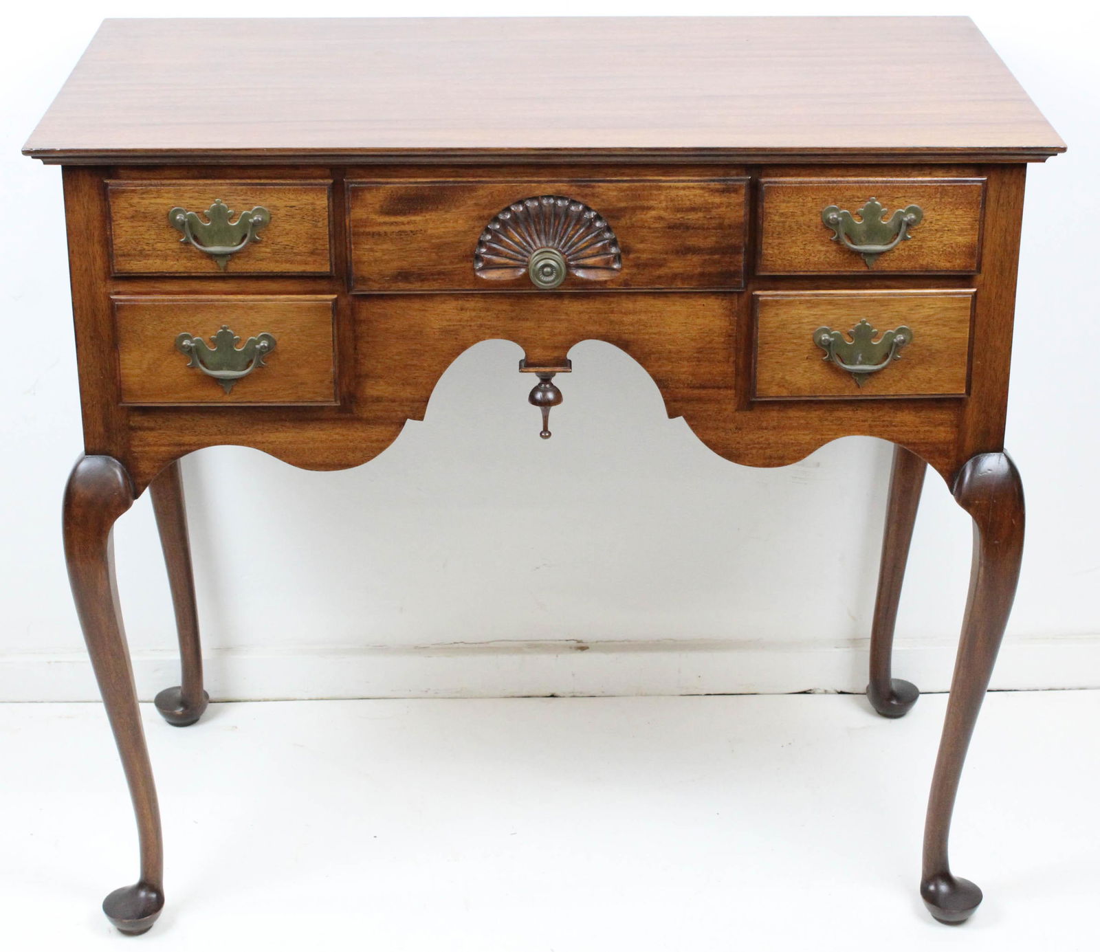 Mid 20th c. Bench Made Mahogany Low Boy: Mid-20th c. bench made Chippendale style mahogany lowboy with fan carved drawer, on cabriole legs with pad feet, hand cut dovetail construction 33" x 36"x 19.5"