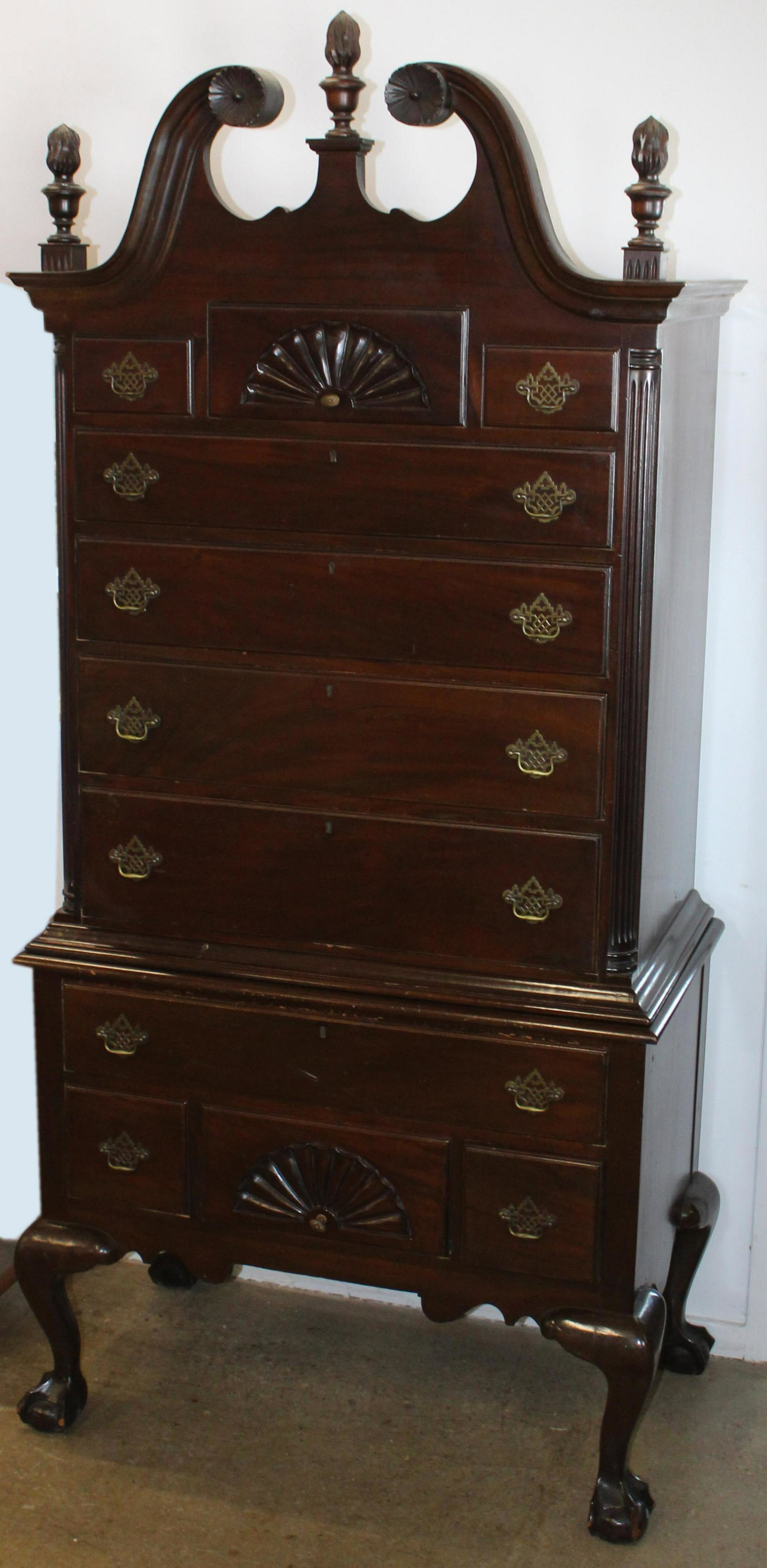 ca. 1910 Chippendale Mahogany Bonnet Top Highboy: ca. 1910 custom bench-made Chippendale style mahogany 2 part bonnet top highboy with broken arch crest having flame finials, fluted pilaster corners, and fan carved drawers, on ball and claw foot base