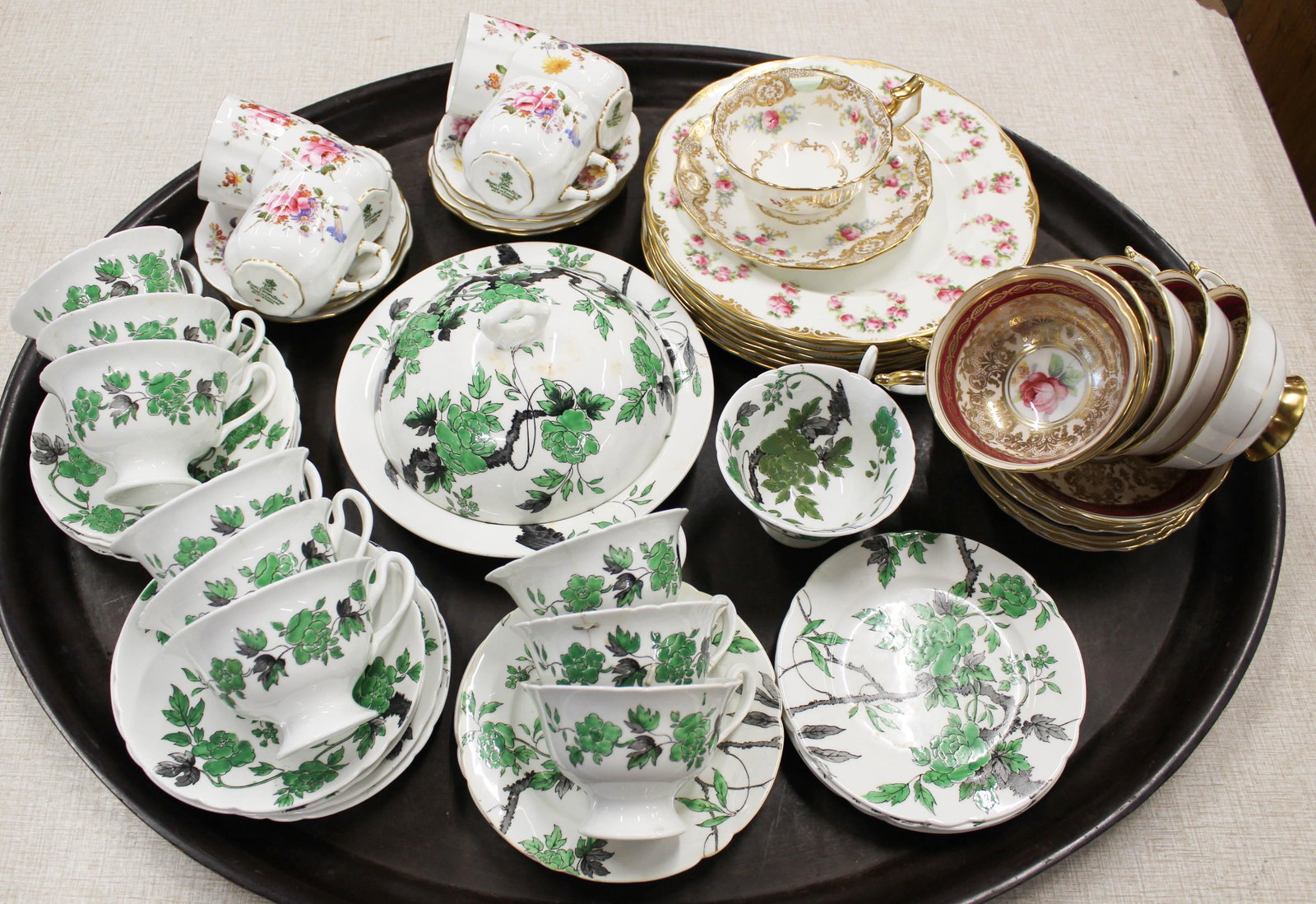 English Bone China Tea Cups and Saucers: Group of English Bone China Porcelain including 6 Royal Crown Derby cups and saucers, 6 Paragon cups and saucers, 6 George Jones & Sons luncheon plates, and partial Aynsley Orientalist breakfast set (