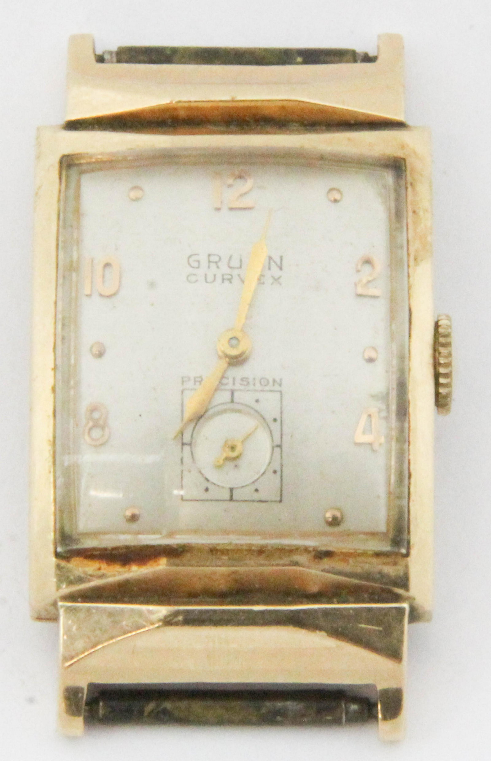 Men's 14k yellow gold Gruen Curvex wrist watch: 14k yellow gold men's Gruen Curvex wrist watch. No band, running condition. 22 mm x 41 mm long.