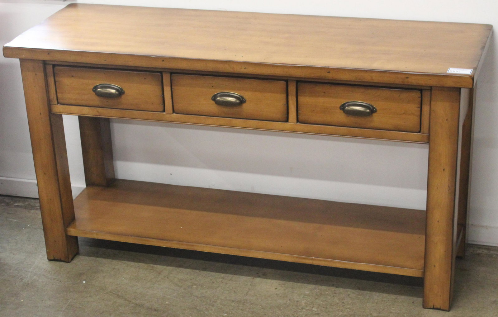 Pottery Barn 3 Drawer Sofa Table or Credenza: Pottery Barn cherry sofa table or credenza console table with 3 drawers having brass cup pulls and lower shelf 30" x 56" x 19"