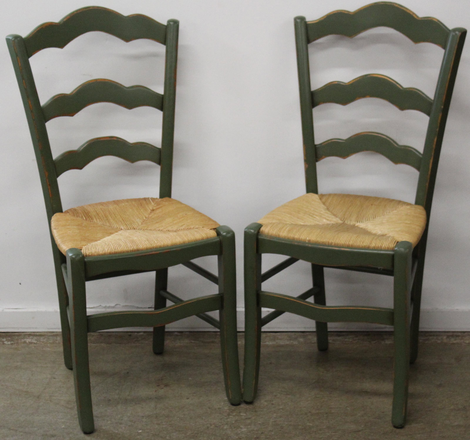 4 Contemporary French Style Ladder Back Chairs: Set of 4 contemporary French style ladder back dining chairs in olive green distressed finished paint with rush seats 39" x 18" x 19"