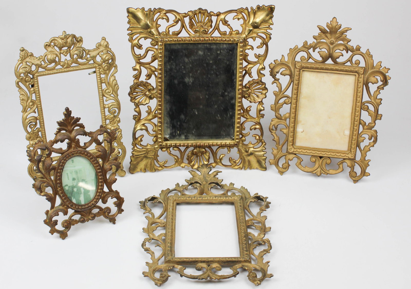 Victorian Gilt Cast Iron Picture Frames: Victorian gilt cast iron picture frames (5 pcs), hts from 8" to 12"