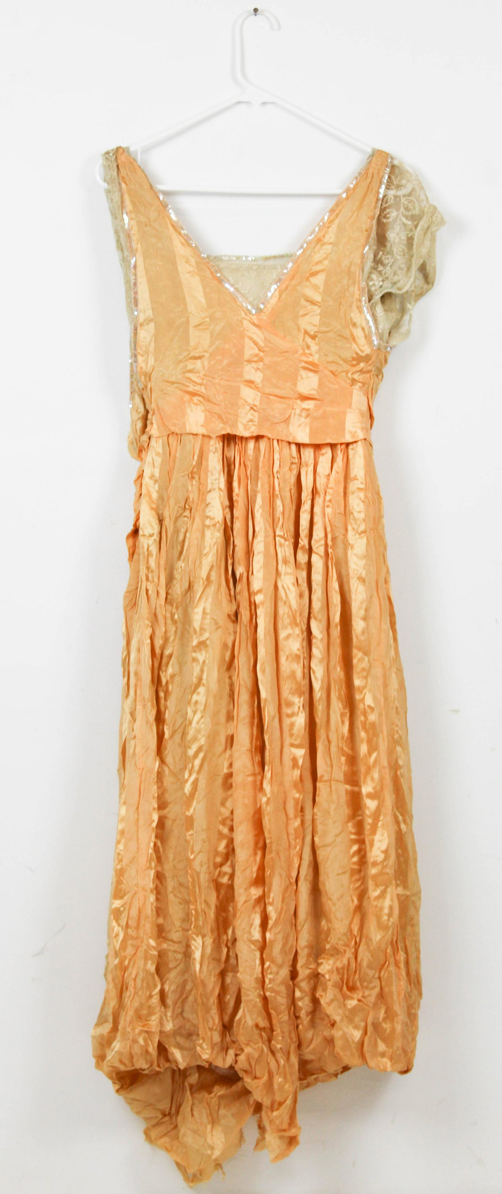 Ca. 1900 vintage peach satin & lace ladies dress: Ca. 1900 vintage peach satin and lace ladies dress. Comes with open work lace shawl and choker. Dress approx. 54" long. Wear to lower edge. Imperfections.