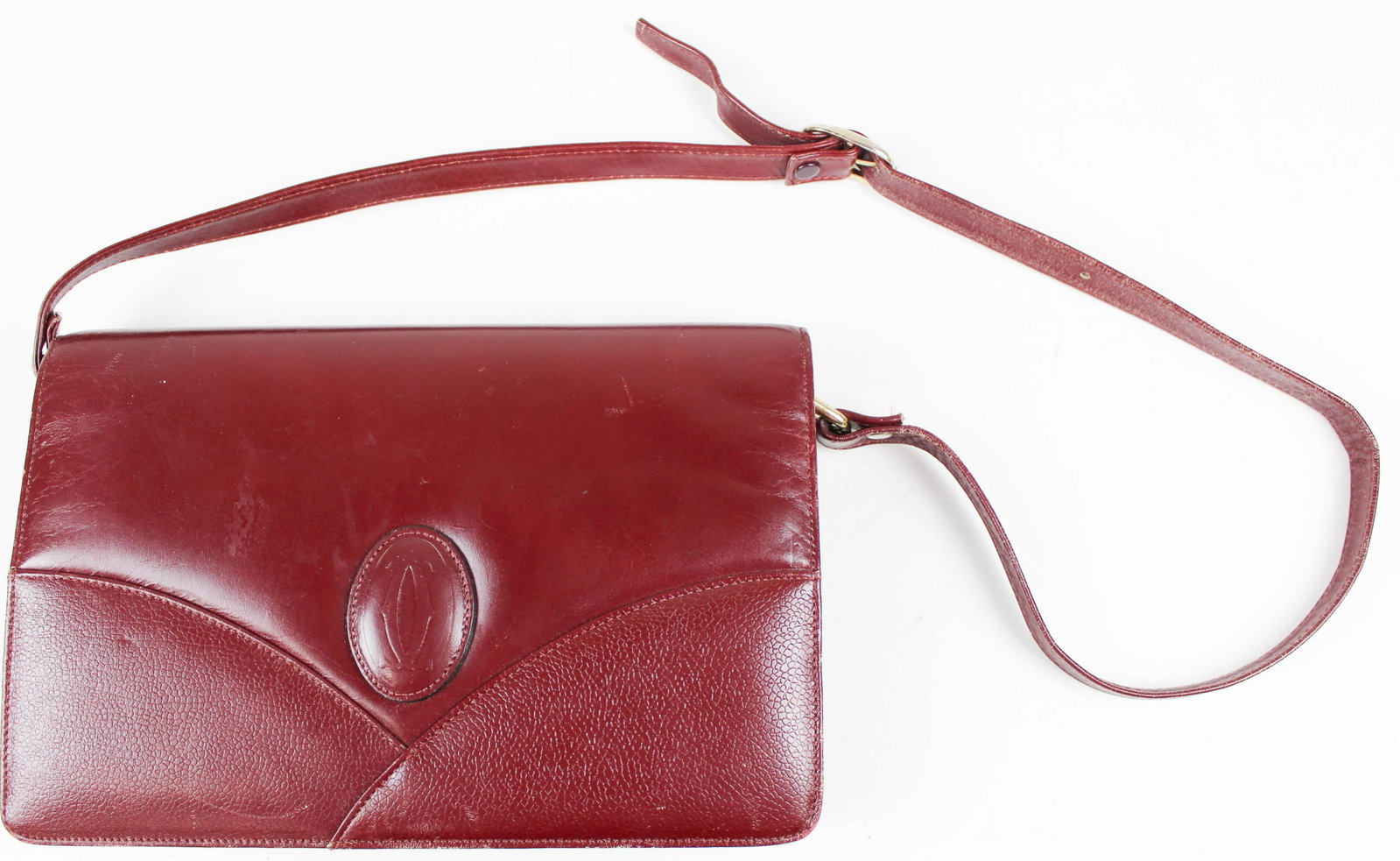Cartier red leather handbag: Marked Cartier Paris vintage red leather handbag. 10" x 7".