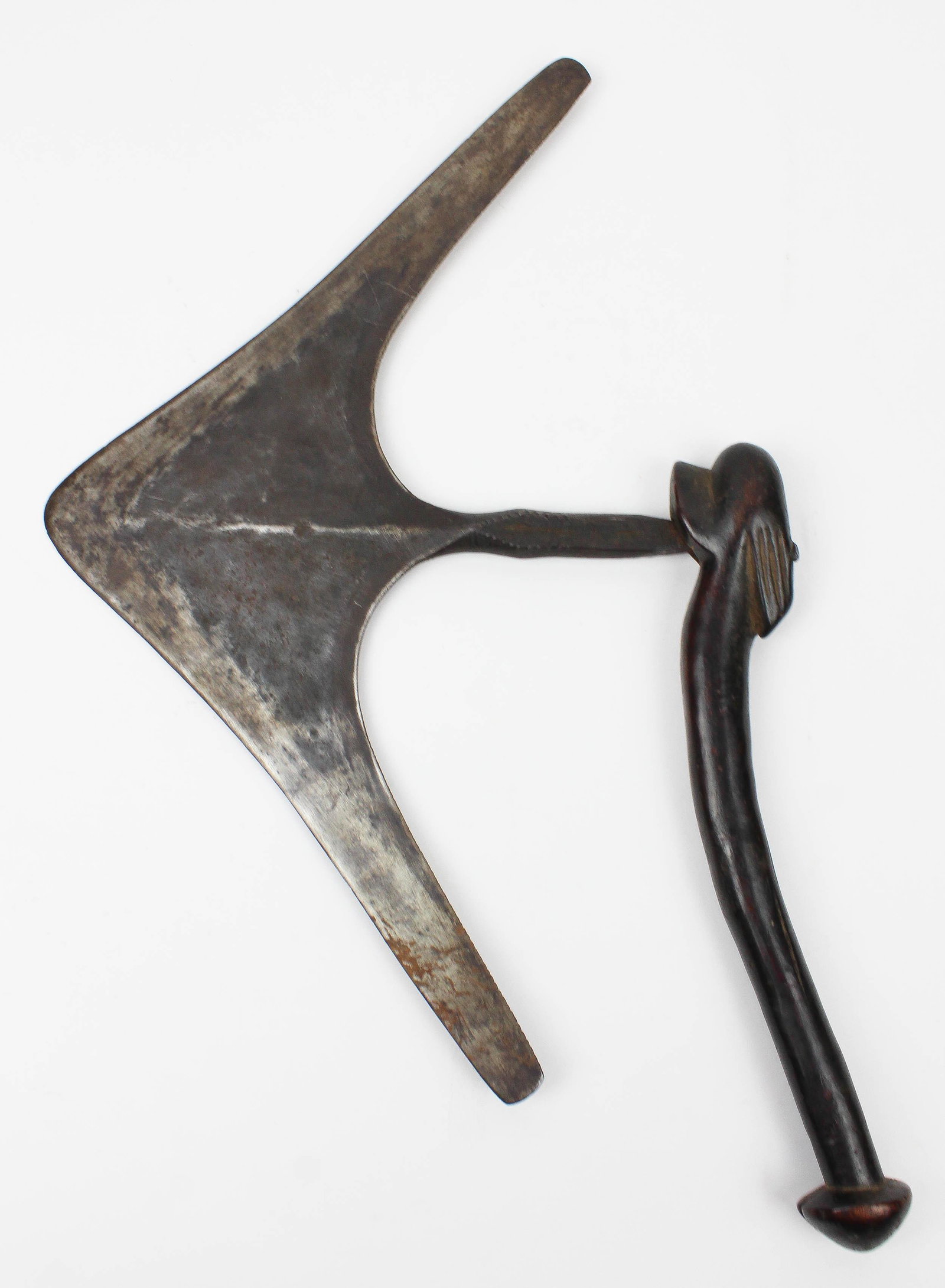 19th c Zulu War Axe with Figural Handle: 19th c Zulu war axe with well carved figural handle, probably Swazi or Sotho (Zulu did not make their own steel weapons), blade width 16 1/2", overall length 19"