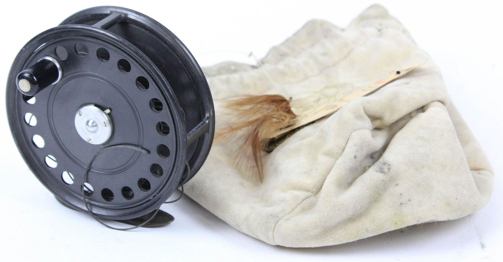 Hardy St. John fly reel with original bag: A Hardy Bros. LTD Alnwick England vintage St. John model fly reel size 3 7/8". Reel etched H M Bergamini Colonel MC. Has original felt lined Hardy reel bag.