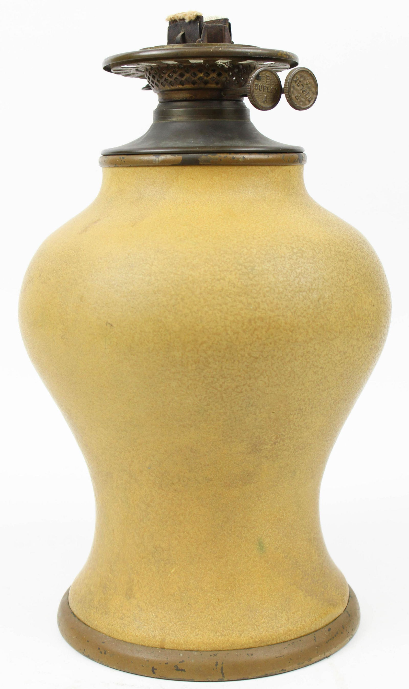 Wheatley Pottery Arts and Crafts Lamp: Wheatley Pottery Cincinnati, OH Arts and Crafts era faience matte yellow glaze vase form table oil lamp marked , with stylized "W.P." mark 12" x 8.5" -drilled through paper label in center of base for