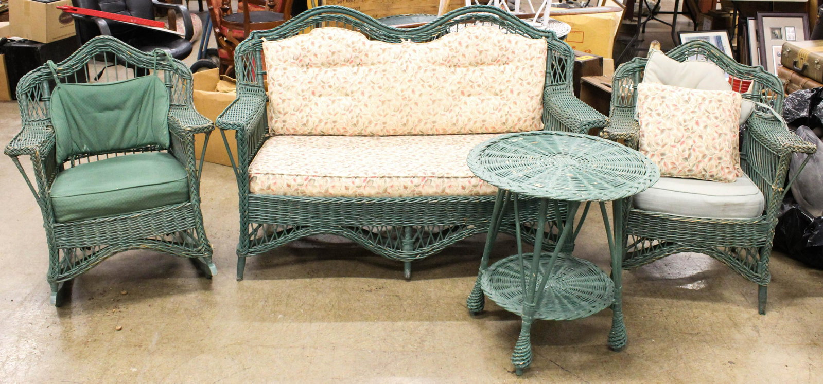 1920's Wicker 4 pc. Parlor Suite in Green Paint: 1920's Wicker 4 pc. parlor suite consisting of arched back settee, rocker, armchair and lamp table in older green paint, some losses and damage