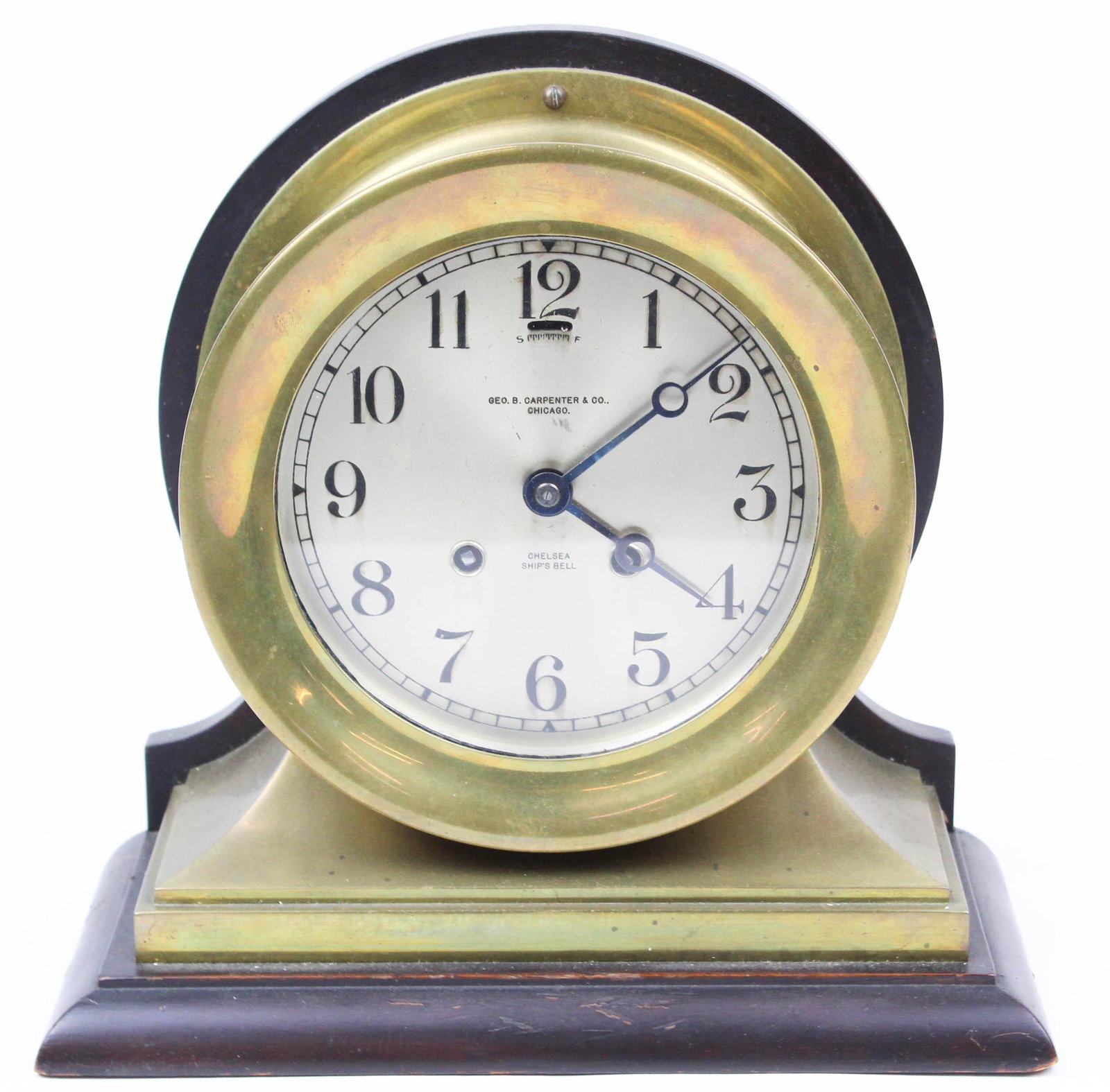 Chelsea Brass and Mahogany Ships Clock: fine mid 20th c. Chelsea Ship's Bell brass and mahogany shelf clock, retailed by Geo. B. Carpenter & Co. Chicago 10" x 10" x 5.5'