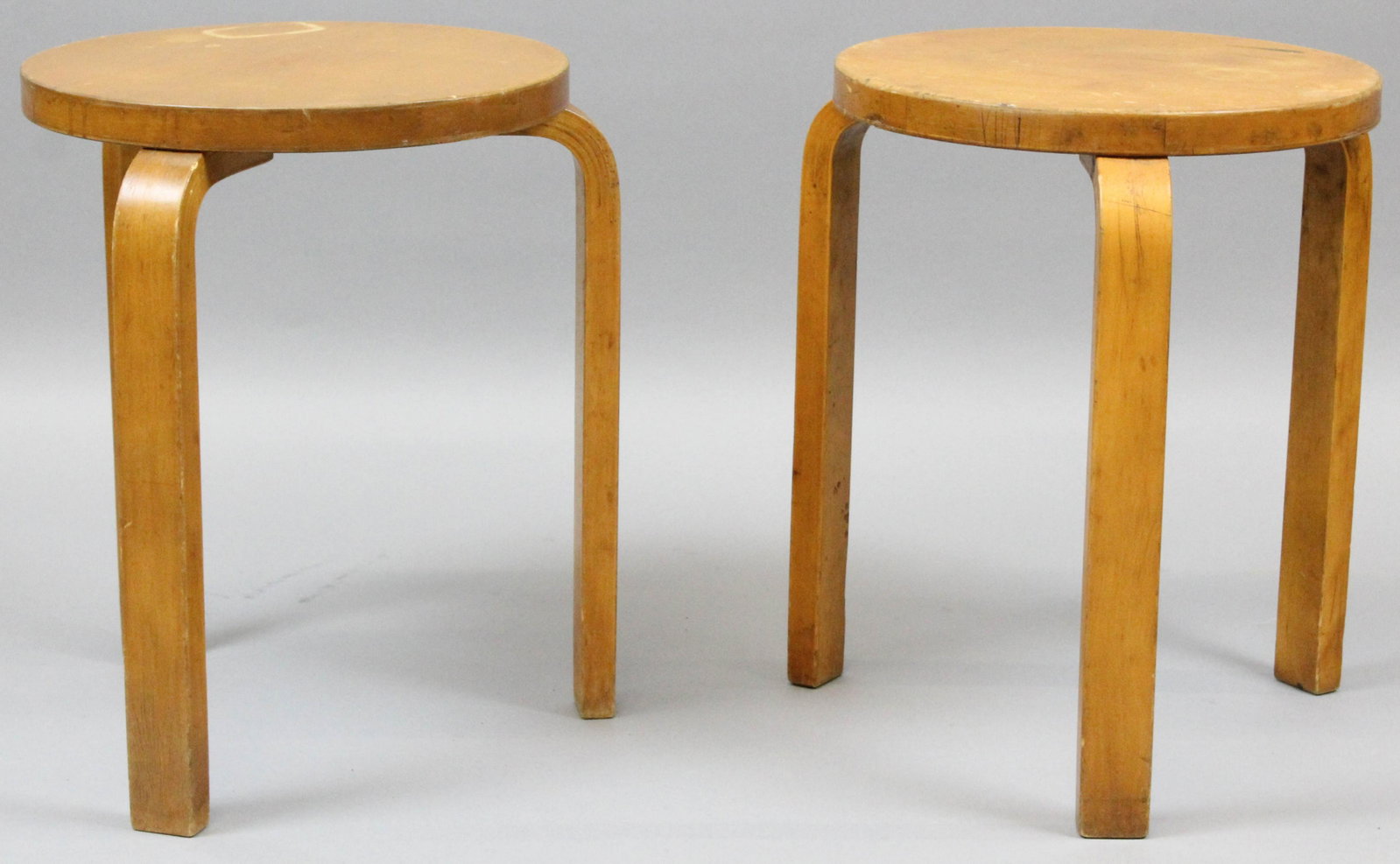 Pr of Alvar Alto Bentwood Stacking Stools: pair of Mid century Alvar Alto bentwood stacking stools, ht 17 1/4", waterstain on top