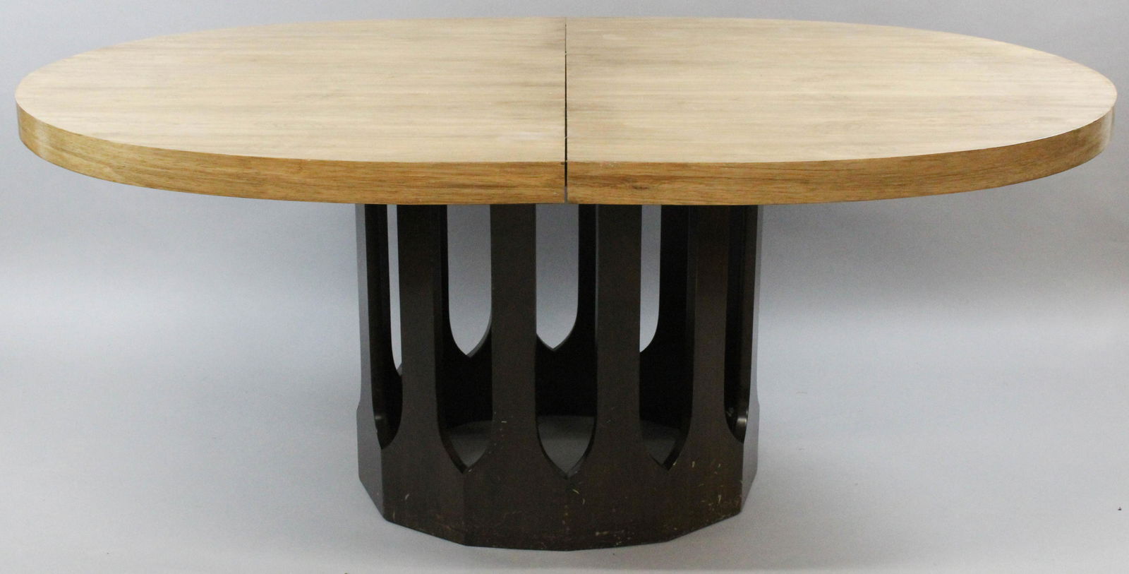 1965 Harvey Probber dining room extension table: 1965 Harvey Probber dinning room extension table. Light rosewood oval veneered top with round open pedestal base. 6' long 42" wide. Has 4 16" wide leaves with drop matched edges. Total length 124" lon