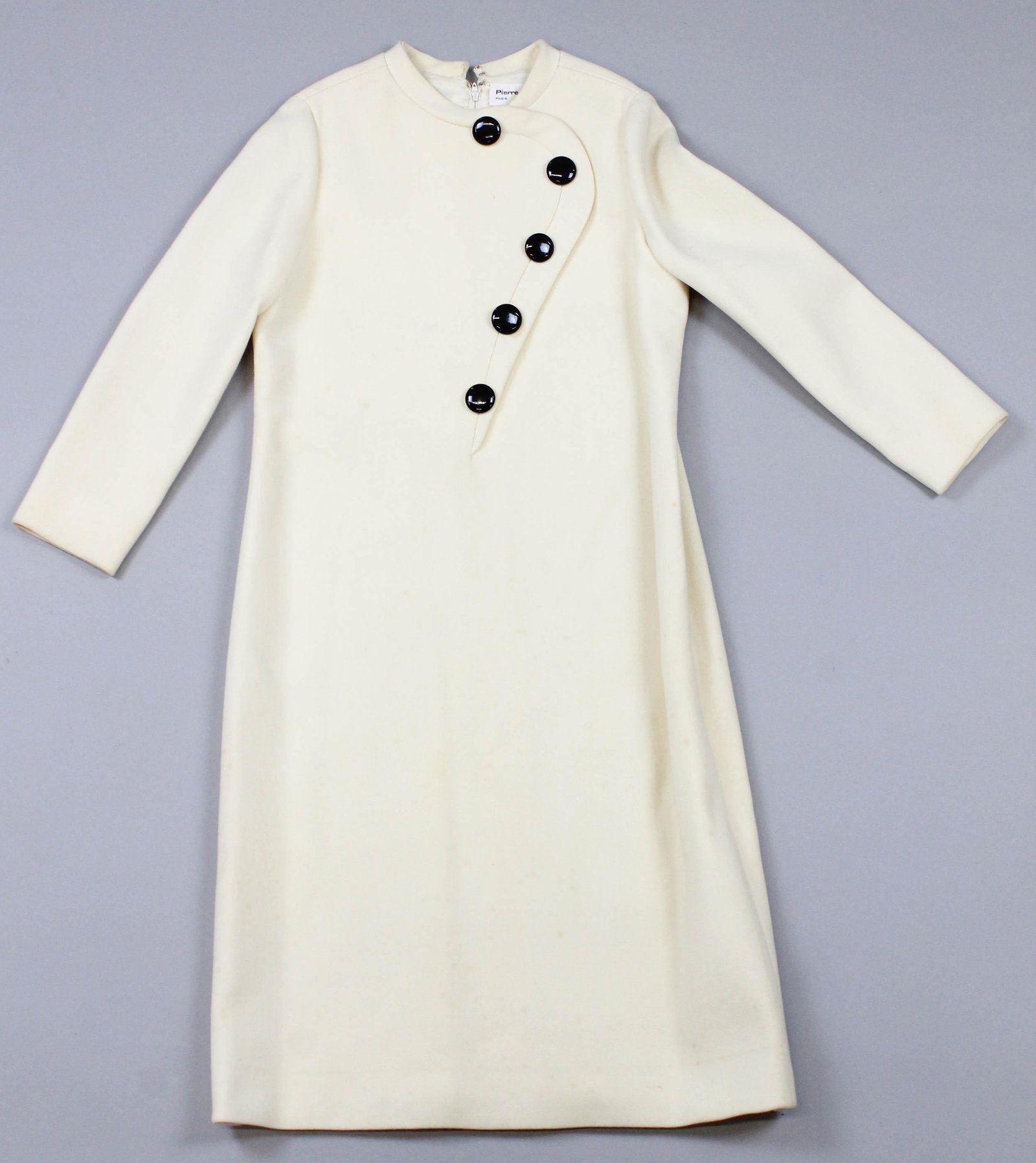 1960's Pierre Cardin, Paris Woman's Dress: Vintage 1960's Pierre Cardin, Paris, New York woman's cream colored wool dress, false button down front, zippered back, few light stains