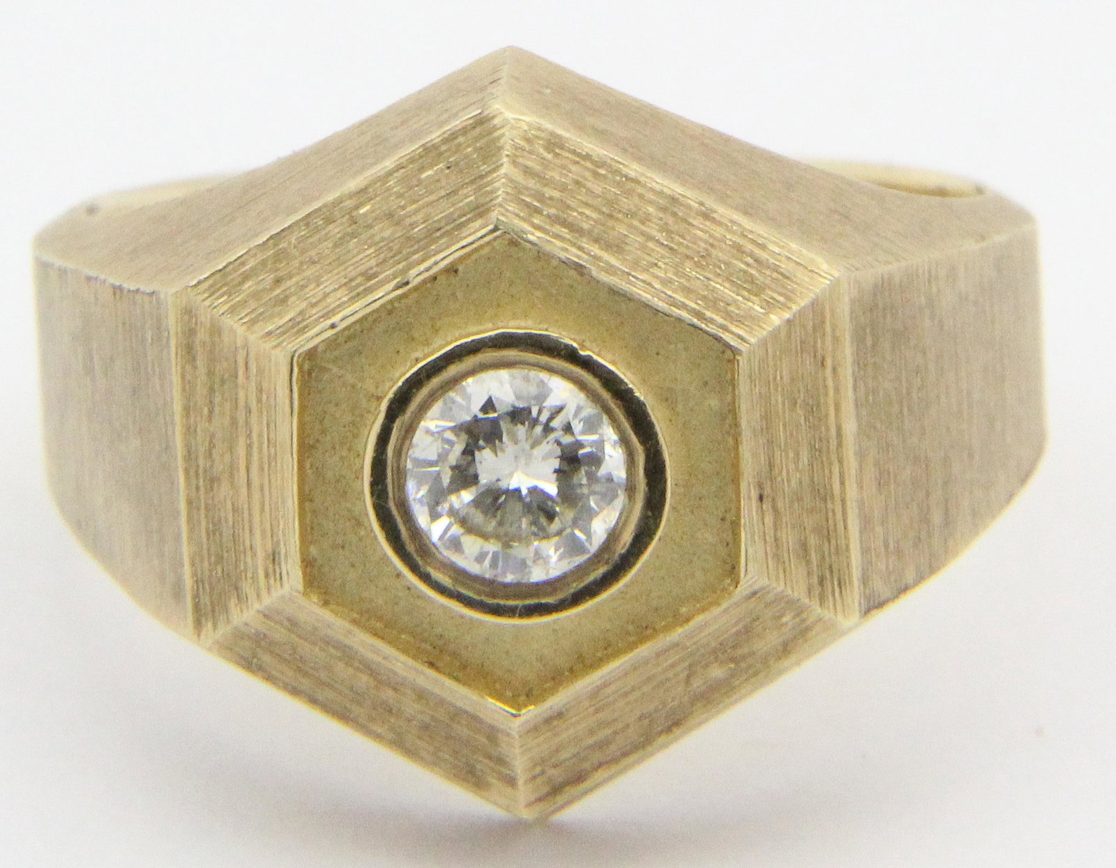 Men's diamond & 14k ring: Men's diamond and 14k yellow gold ring having a .35 ct round cut solitaire diamond. Ring size 8. 8 grams total weight.