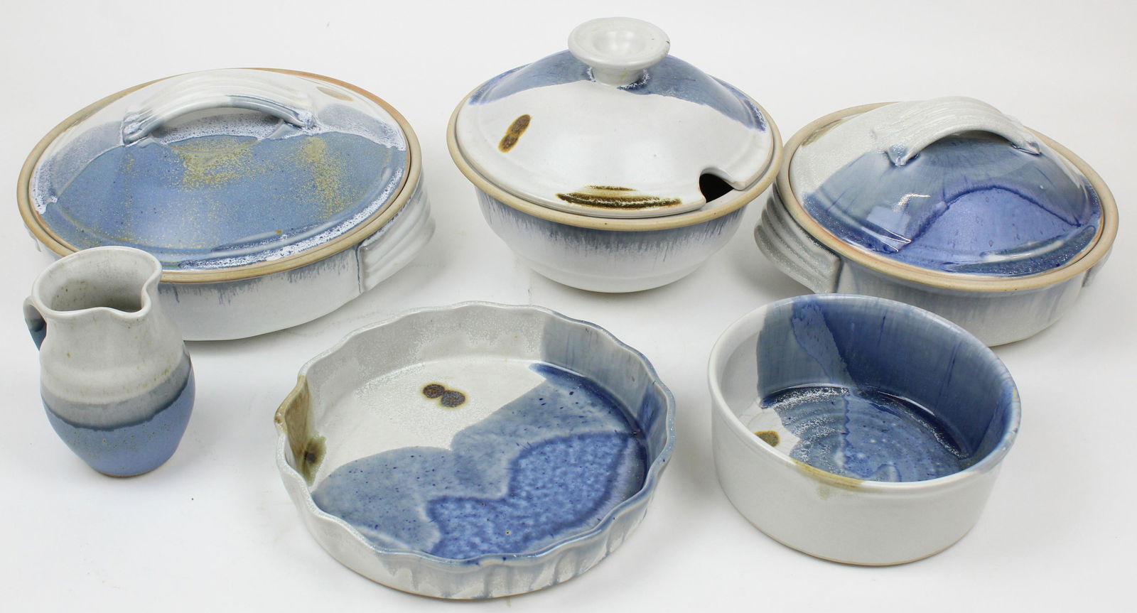 6 pcs. Stone Soldier Jacksonville, VT Pottery: 6 pcs. Stone Soldier Jacksonville, VT contemporary studio pottery tableware and bakeware including two covered casseroles, covered serving dish, round pan, low tart pan