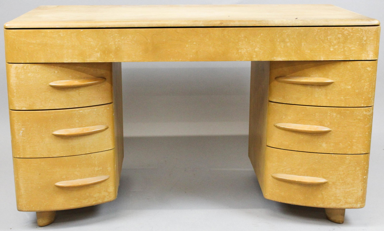 Heywood Wakefield desk: Heywood Wakefield mid century design maple double pedestal desk. Curved drawer fronts. 50" wide.
