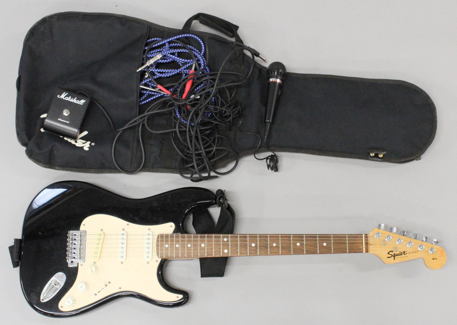 Fender Squire Stratocaster Guitar, Accessories: Fender Squire Stratocaster electric guitar, Marshall Channel pedal, Sony F-V9 microphone