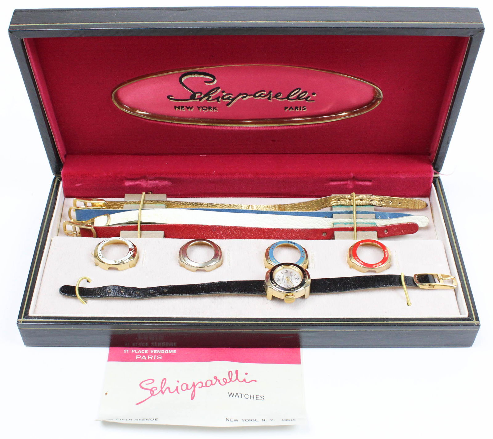 Women's Schiaparelli wrist watch: Women's Schiaparelli wrist watch in it's original box. Watch comes with 5 different case covers and 5 different wrist bands. Has original paper.