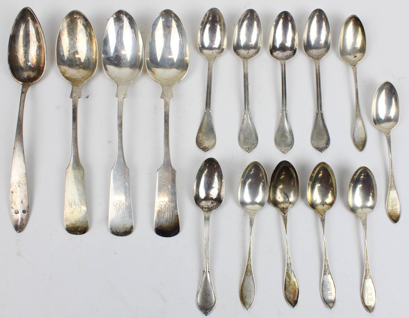 15 pcs. Sterling and Silver Flatware: 15 pcs. Sterling and Silver including Continental silver table spoon, 3 Gorham tablespoons, 6 Wood & Hughes NYC Victorian teaspoons, 5 sterling teaspoons with "S" monogram 15.7 troy oz.
