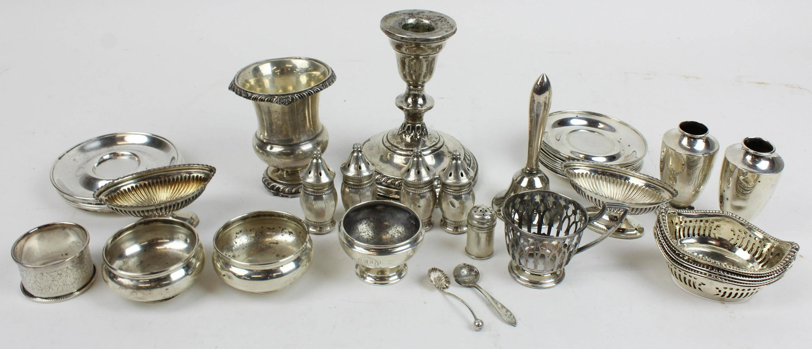 Lot of Assorted Sterling Silver Holloware: Lot of Assorted Sterling Silver Holloware including 6 Gorham reticulated nut dishes, 17 demitasse saucers, urn, weighted candlesticks, 3 salt cellars, napkin ring, 2 fine weighted ribbed English salt 