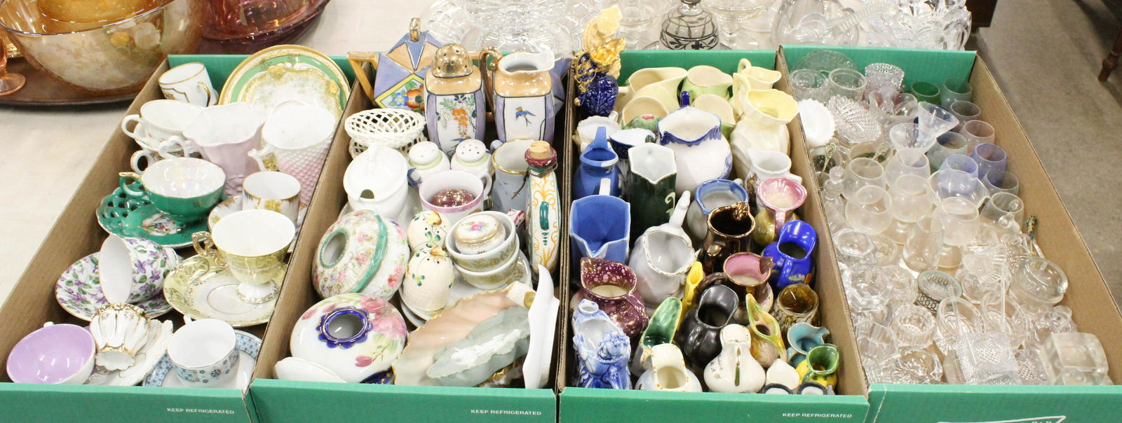 Collection of Salt Cellars, Creamers, Porcelain: Collection of glass salt cellars, collectible creamers and miniature pitchers, and other small porcelain items including Belleek, Clarice Cliff, Copper Lustre, etc.