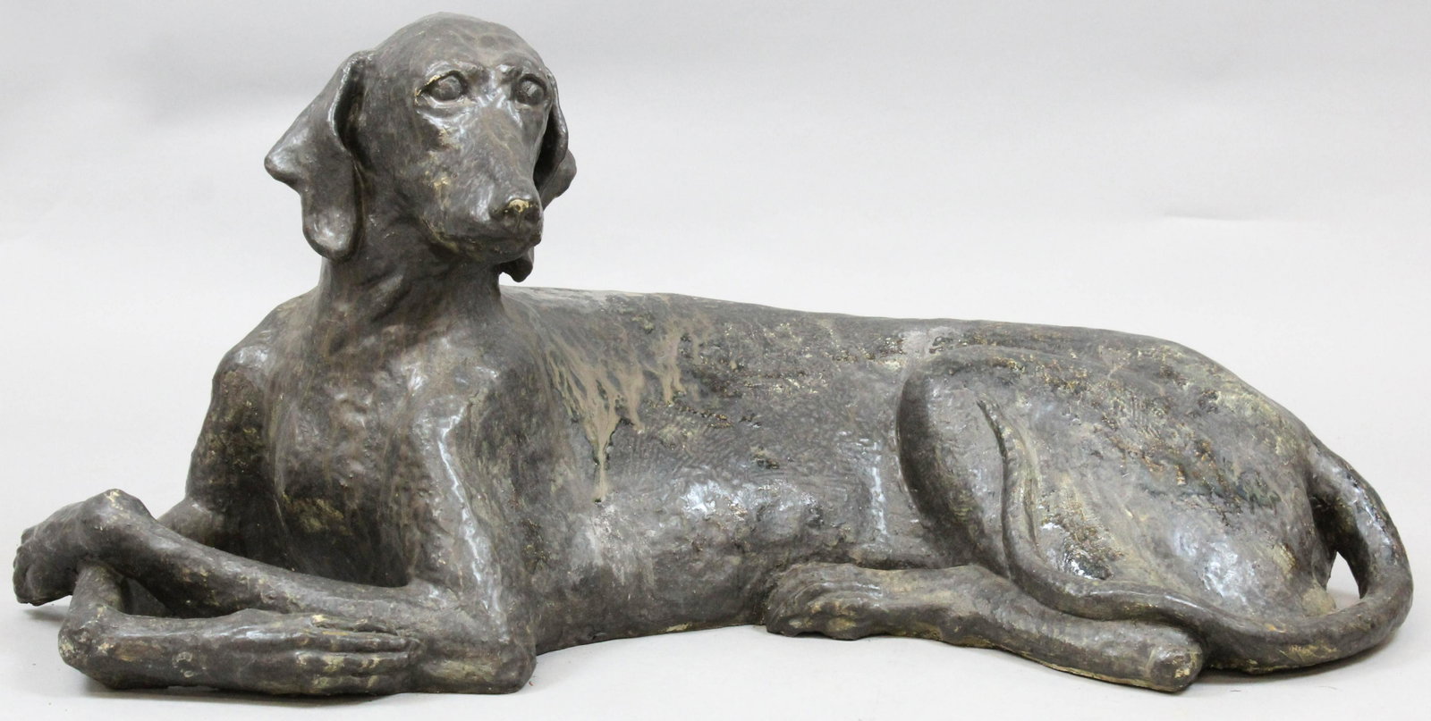 Barbara Kaufman Dog Sculpture: Barbara Kaufman (Woodstock, VT 1918- 2015) life sized pottery sculpture of a reclining dog, length 41"
