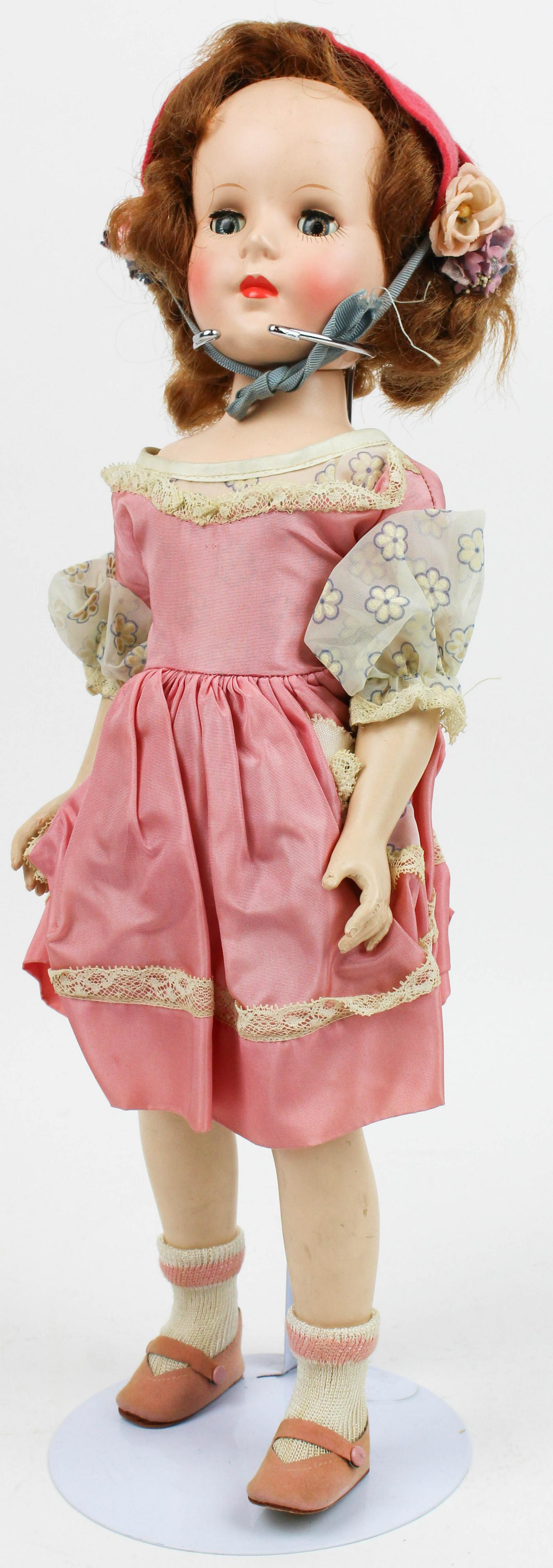 American Character Composition Walker: 1950's American Character composition walker doll, head turns when legs move, 18"
