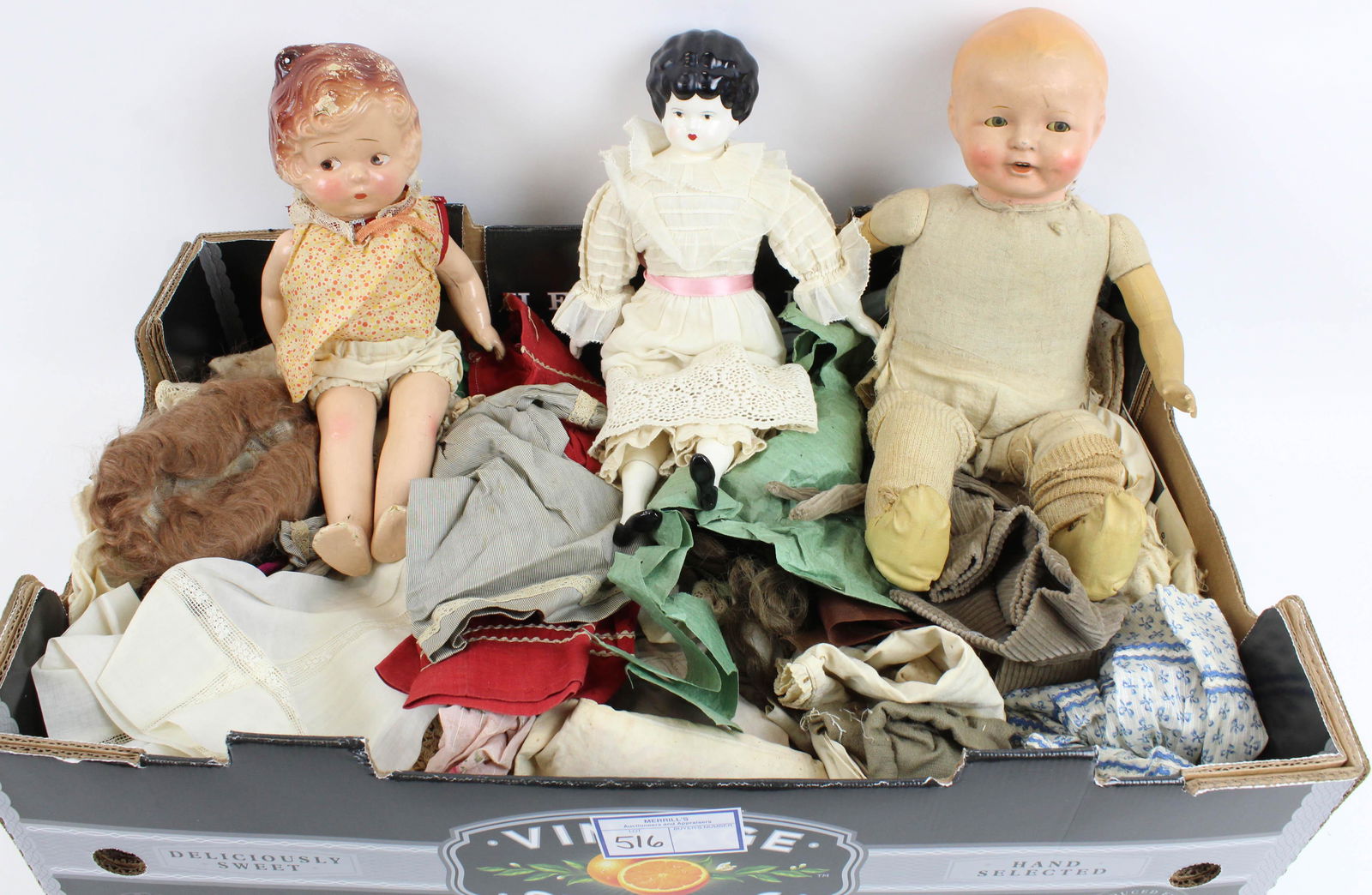 Composition Dolls, Doll Clothes: ca 1910 Ideal composition doll with flirty/ googly eyes (15 1/2"), another composition doll (visible wear), & a group of vintage doll clothes