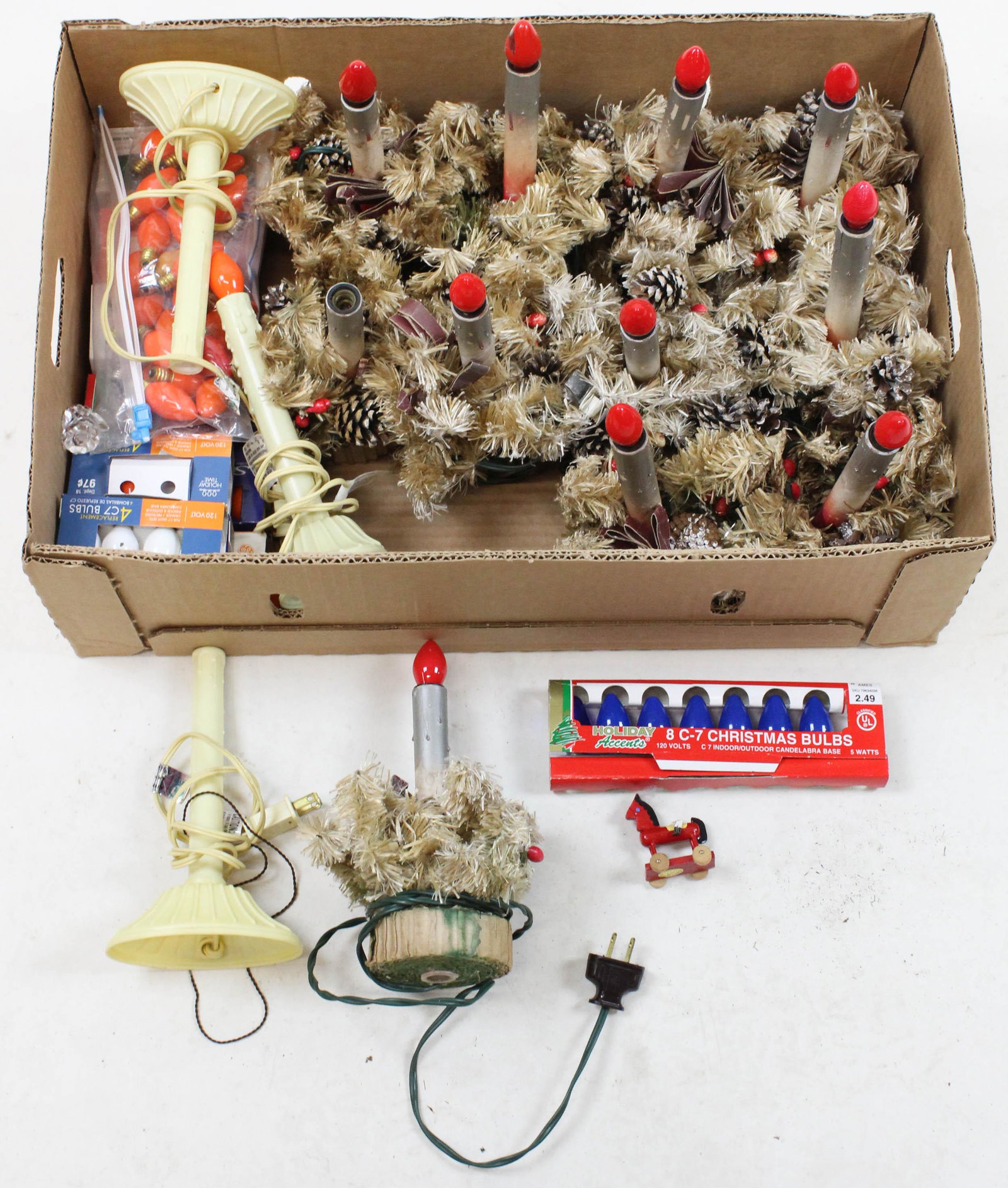 11 Antique Painted Electric Christmas Candles: lot of 11 vintage ca. 1930's paint decorated boxboard electric Christmas Candle lights with brush foliage and pine cone decoration, accompanied by extra bulbs