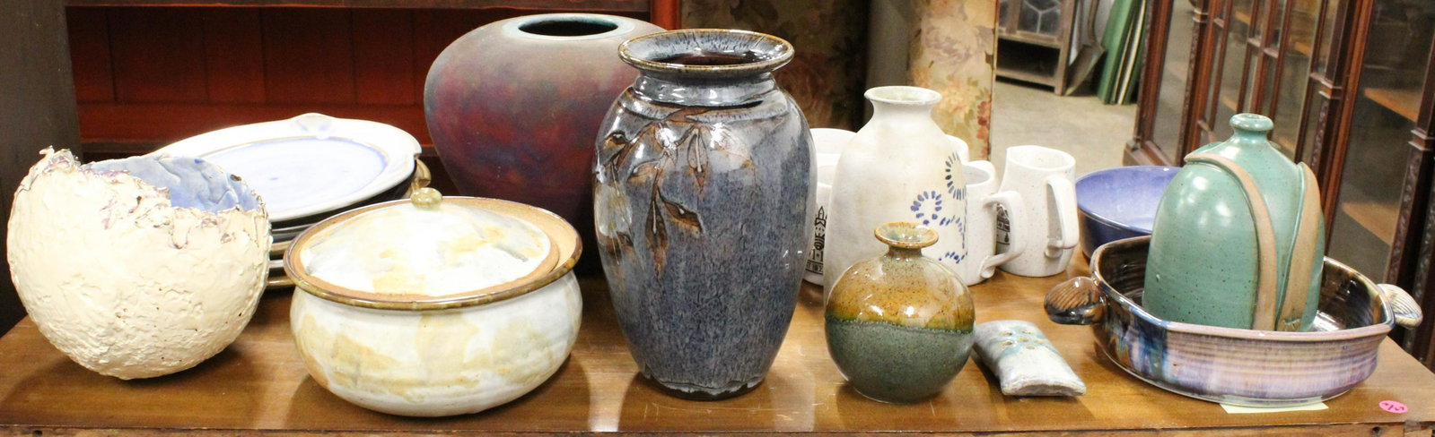 Collection of 22 pcs. Contemporary Studio Pottery: Collection of 22 pcs. contemporary studio pottery including Lyncharm, NS Canada dish, Leslie Mitchell Mineola, TX Raku vase, Mud River vase, Charlet Davenport Woodstock, VT vessel, 7 pcs. Onion River 