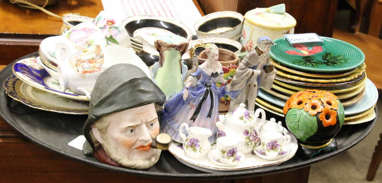 English Bone China Porcelain, Majolica, Etc.: Lot of ceramics including English Bone China porcelain tea cups and saucers, partial Regency tea set, Paragon cake plate, 13 pcs. Majolica glazed pottery incl. Sarreguemine, German bisque 'old salt' h