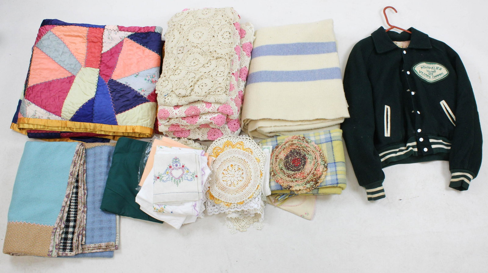 Lot of Vintage Linens and Needlework: Lot of Vintage Linens and Needlework including crocheted bedspreads, 2 late 20th c. crazy quilts, striped wool blanket, plaid wool lap robe, embroidered pillowcases, crocheted doilies, etc.