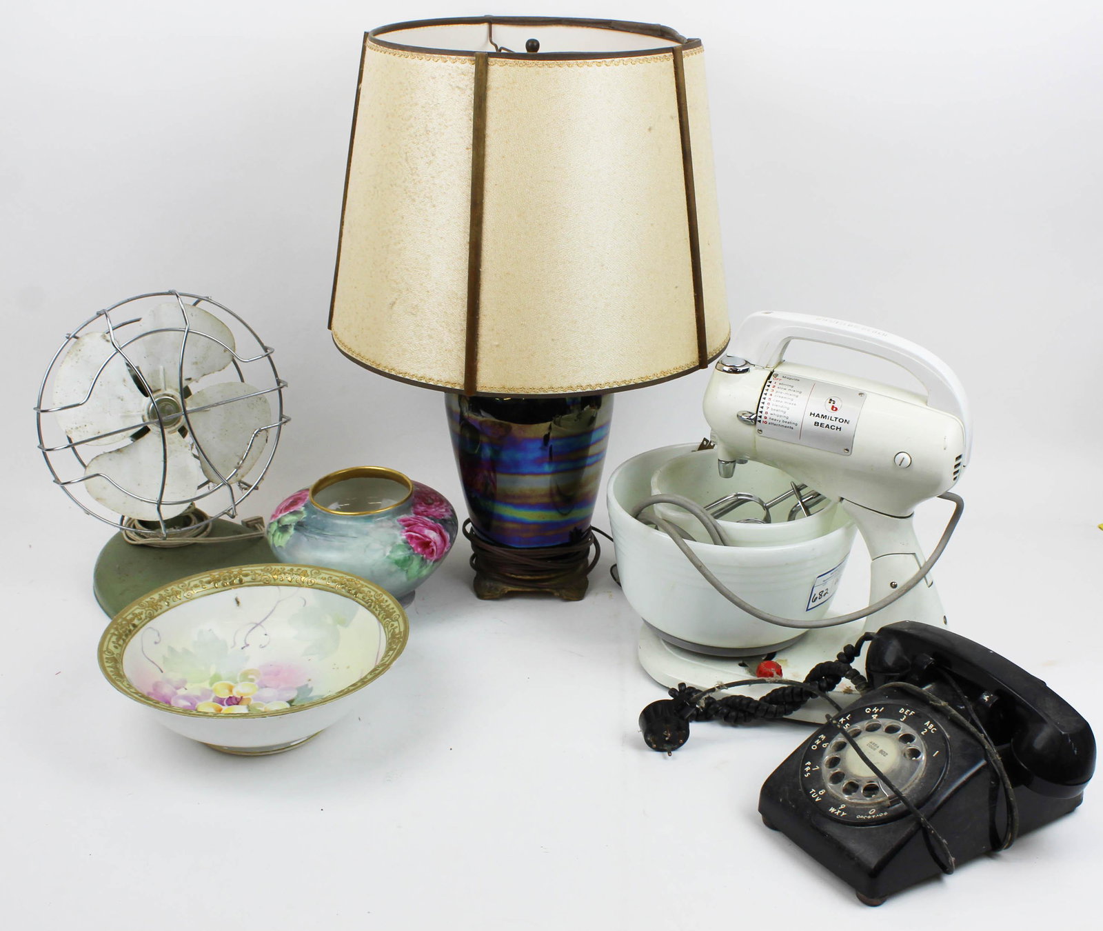 Group of 1950's Housewares, Lamp, Fan: Group of 1950's Housewares including metal blade olive green fan, Hamilton Beach mixer with milk glass bowls, purple iridescent table lamp, black rotary phone