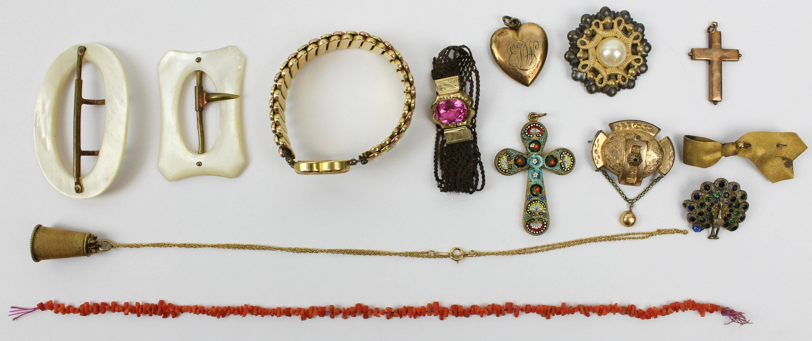 Fine group of Victorian jewelry: Fine group of Victorian jewelry including a yellow gold & hair bracelet, Victorian yellow gold brooch pendant, red coral bracelet, m.o.p buckles, heart rolled gold wrist locket and more