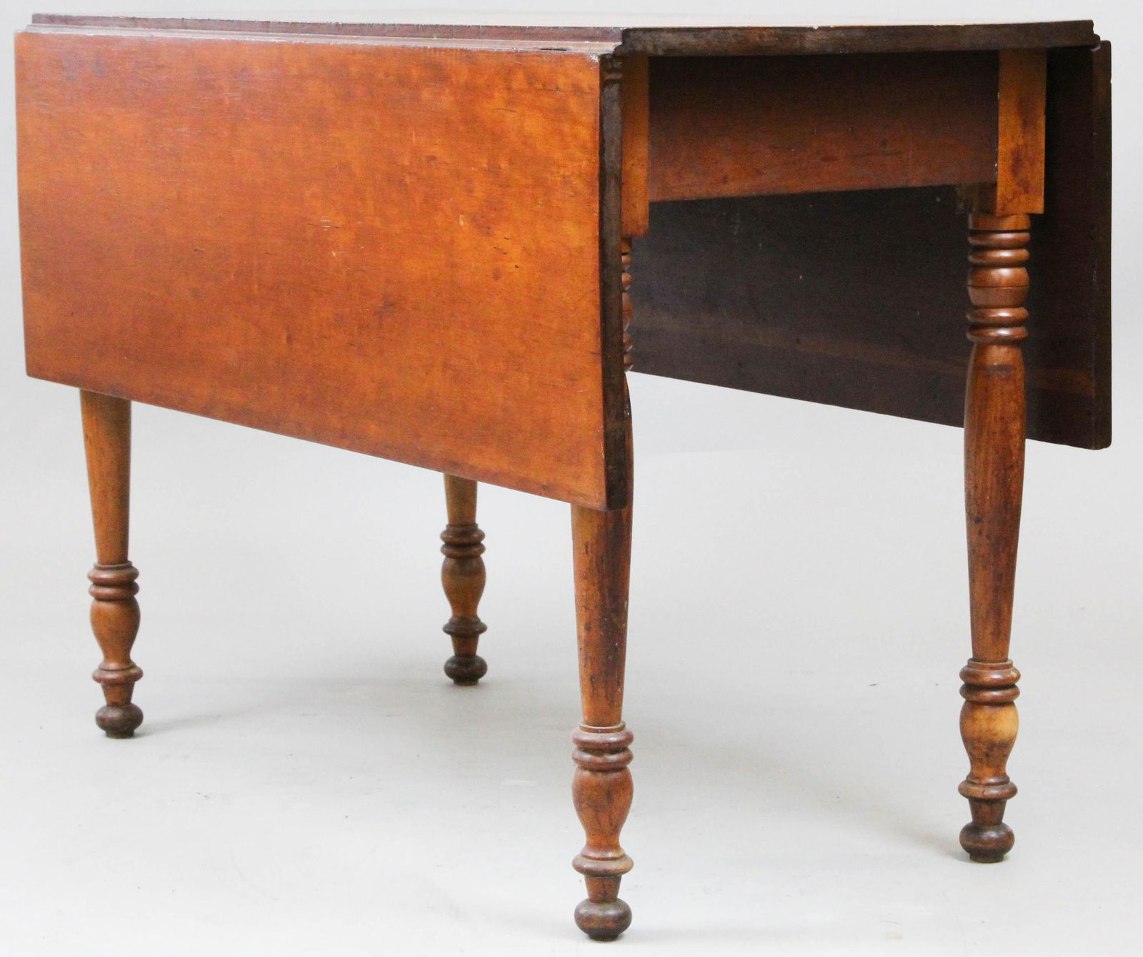 Sheraton Cherry drop leaf table: Sheraton cherry drop leaf table. 42" long.