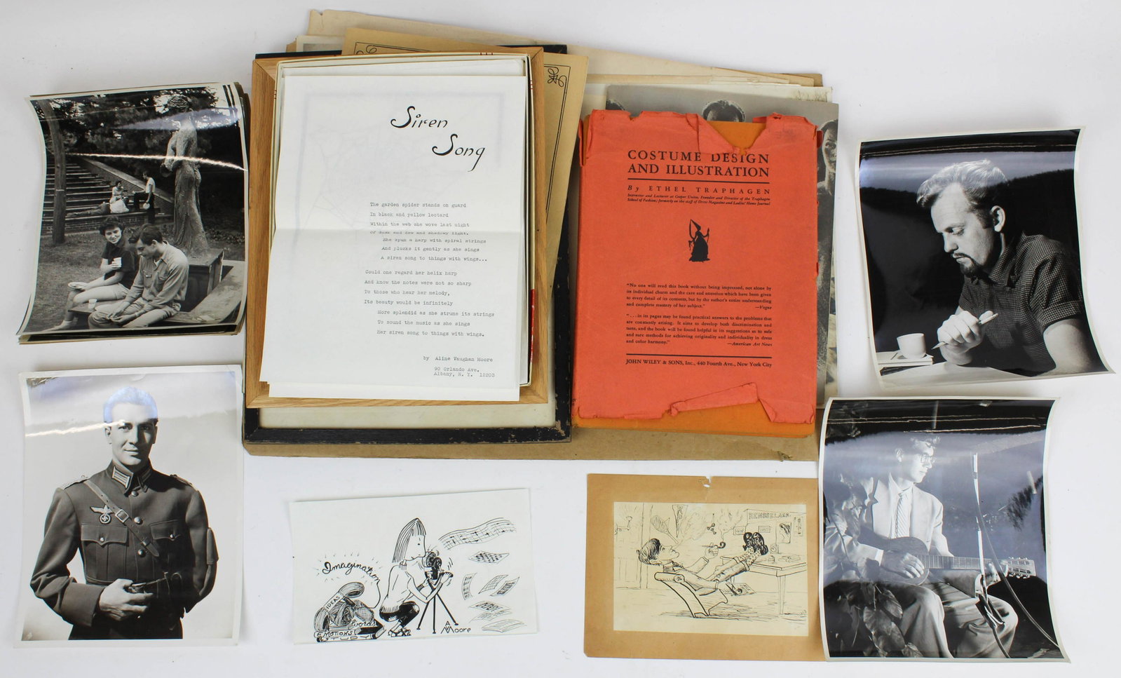 Theatrical Photos, Cartoons, Poetry Manuscripts: Theatrical photos, cartoons including G MacConahie Golfing, typewritten poetry manuscripts by Aline Vaughn Moore (some submitted for publication & returned)