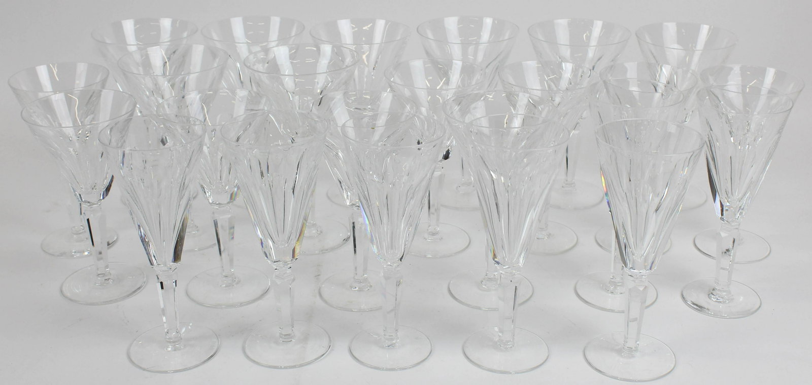 24 pcs. Waterford Sheila Irish Crystal Stemware: 24 pcs. Waterford "Sheila" pattern Irish crystal paneled cut glass stemware including 7 champagne flutes, 8 red wine glasses, 9 dessert wine glasses