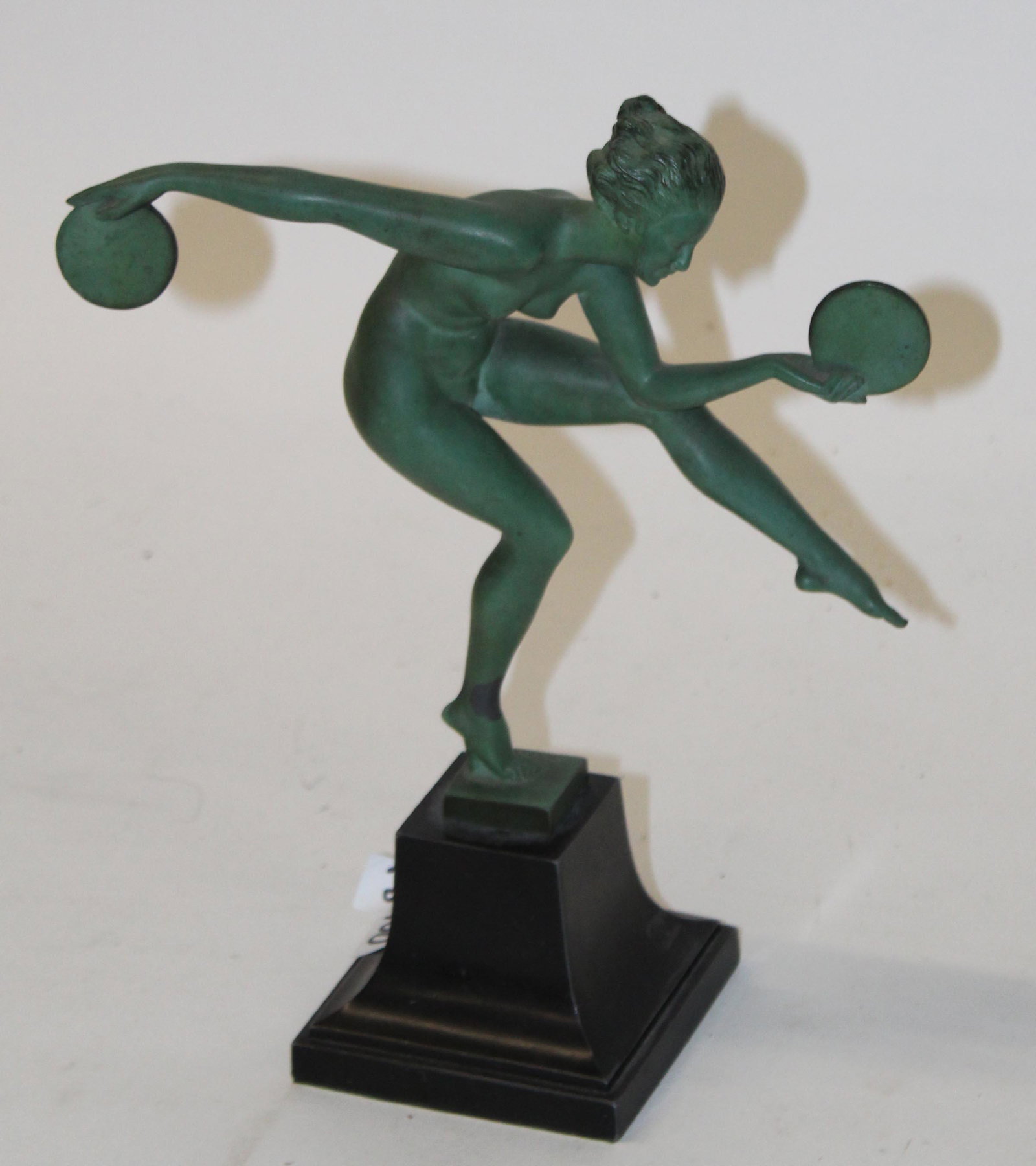 Marcel Bouraine Art Deco Nude Dancer: 1930 French Marcel Bouraine French Art Deco nude disc dancer, signed with Bouraine's pseudonym "Derenne", attributed to Max Leverrier, Paris, patinated cast art metal, overall ht 10 1/2", flaking at a