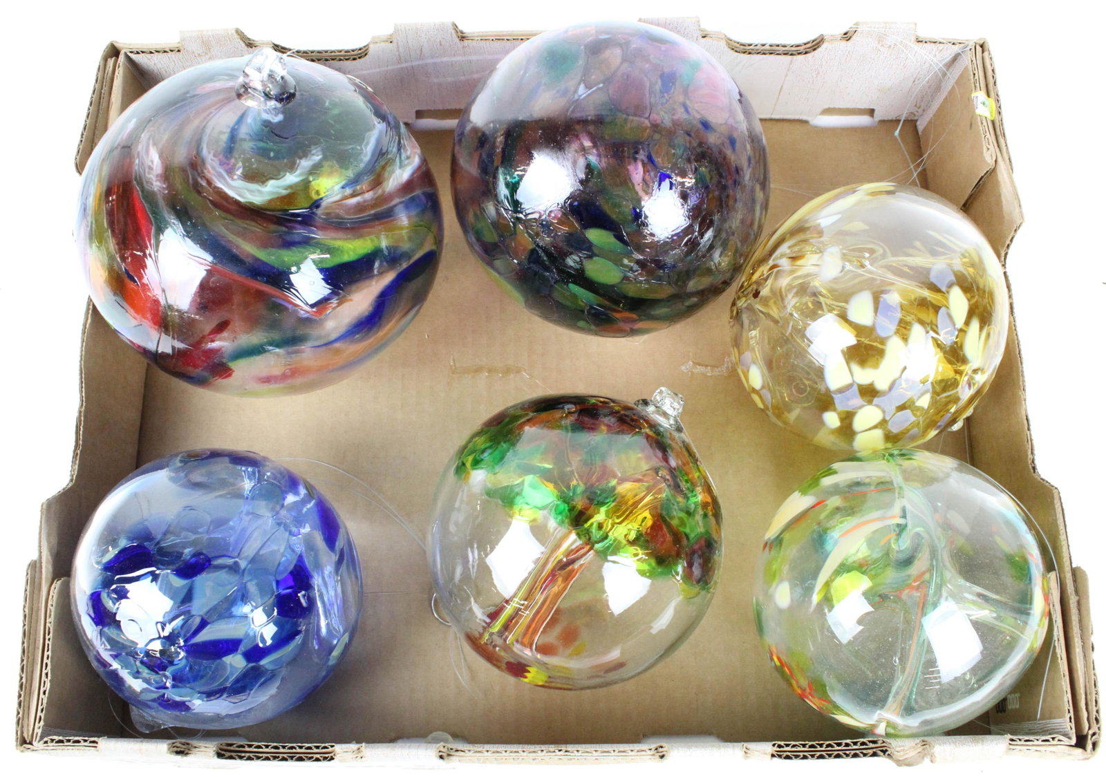 6 Kitras Contemporary Blown Art Glass Orbs: 6 Kitras Contemporary Blown Art Glass hanging Orbs or Witches' Balls, labeled "Made in Canada" in varying colors, some with tree of life motif approx. 5"-7" dia.