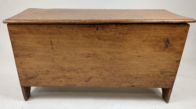 Refinished pine lift top chest: New England 19th c pine refinished boot jack end lift top box. 42" long.