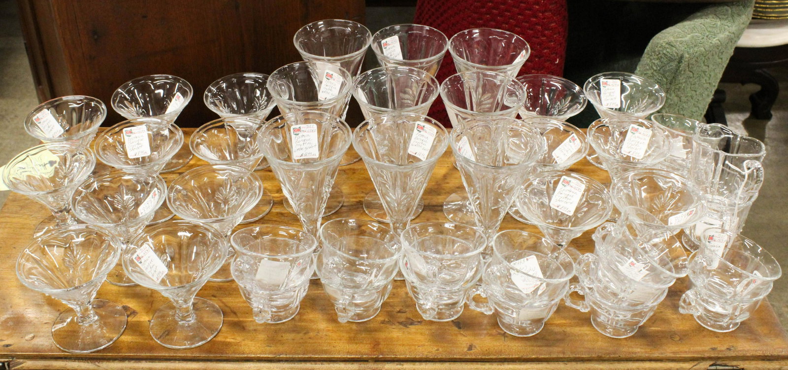 42 pcs. Fostoria Baroque Glassware: 42 pcs. Fostoria "Baroque" pattern Elegant Depression-era glassware including water goblets, sherbets, sugar and creamer, punch bowl cups, etc.