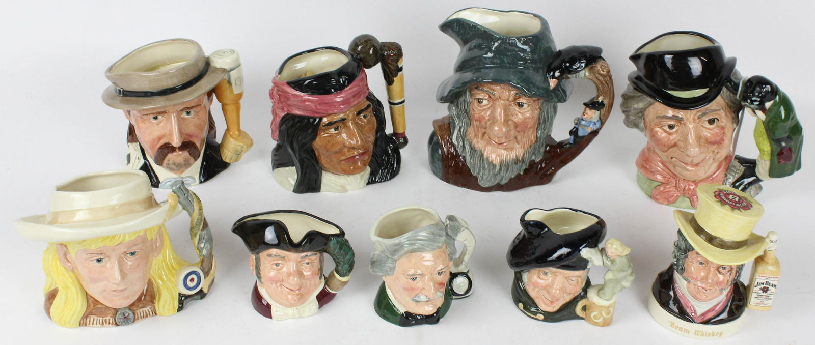 9 Royal Doulton English Porcelain Toby Jugs: Collection of 9 Royal Doulton English Porcelain Toby Jugs including Rip Van Winkle, The Carpenter and Walrus, Wild Bill Hickok, Annie Oakley, Geronimo, Old Mr. Turveytop, Tam O'Shanter, Mark Twain, Mi