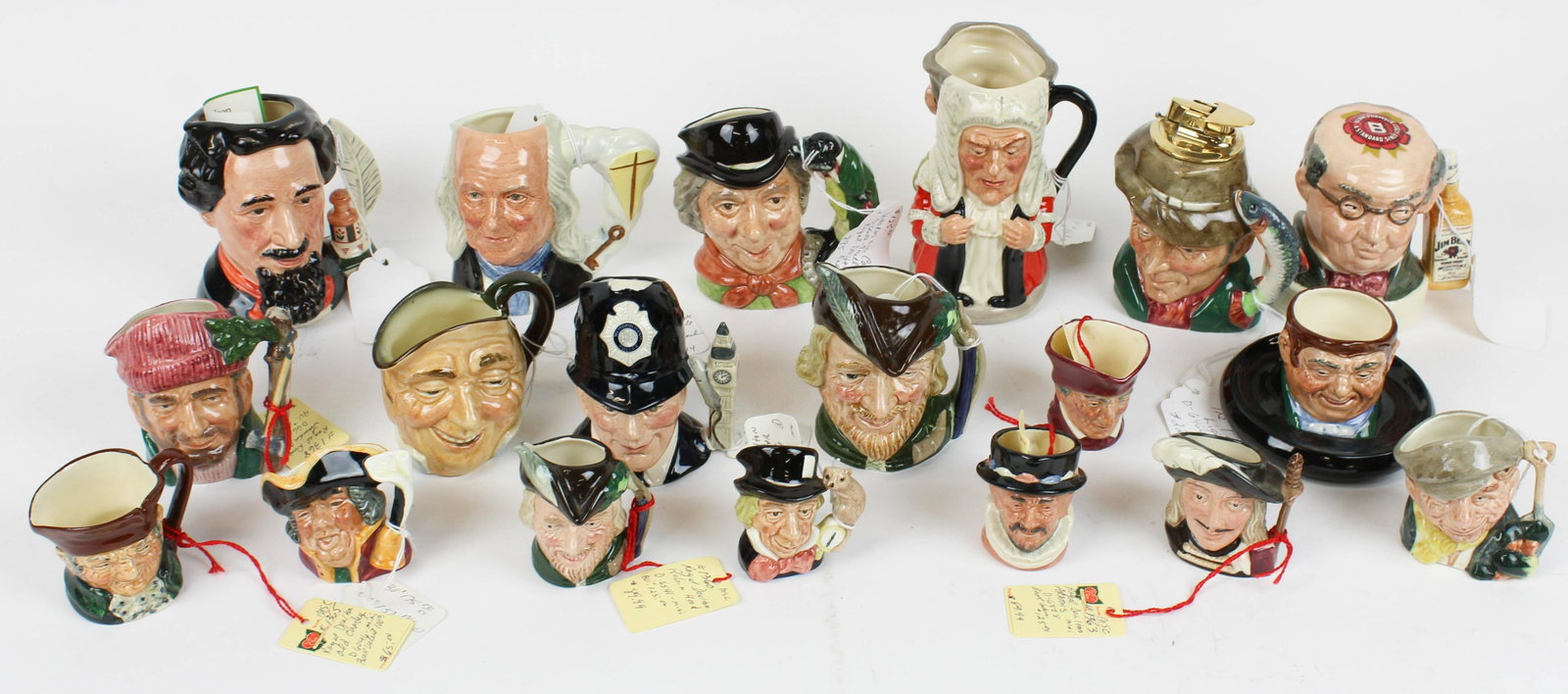 19 Royal Doulton Items and Miniature Toby Jugs: Group of 19 Royal Doulton Items including 8 miniature Toby Jugs, Jim Beam decanter jug, match safe, lighter, The Judge and Thief jug, etc. ht. 2.5"-5.5"