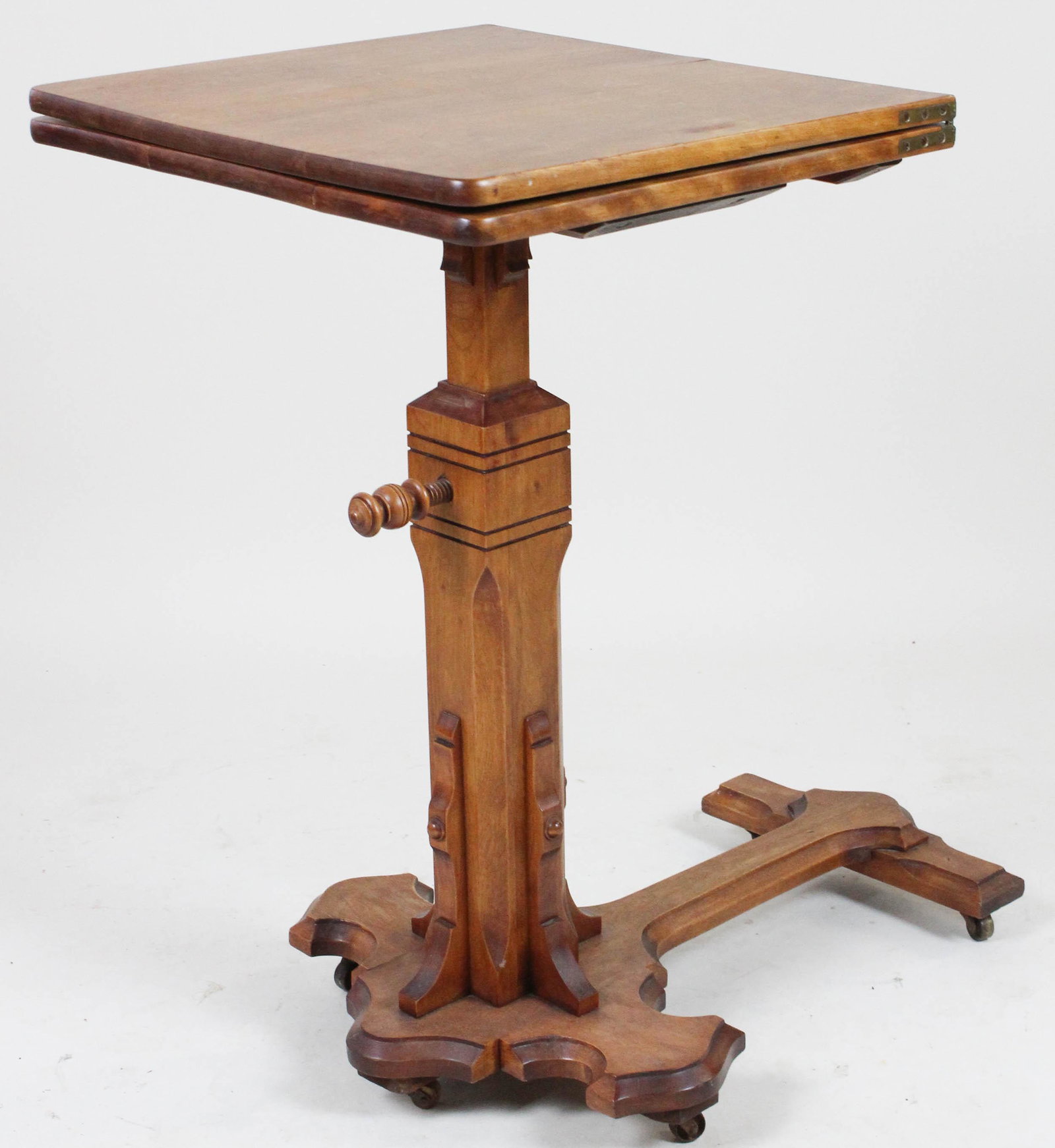 Victorian birch adjustable bedside table: Victorian flame birch adjustable lectern or bedside table. Flip top, Adjustable height, castors. 36" long (open) 19" wide.