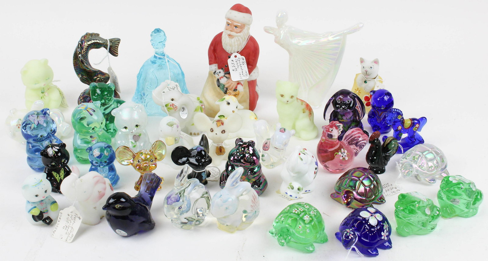 Collection of 39 Fenton Art Glass Novelties: Collection of 39 Fenton Art Glass Novelties including Santa Claus, bell, ballerina, turtles, frogs, rabbits, cats, bears, elephants, and other animals, many with iridescent, frosted, and hand painted
