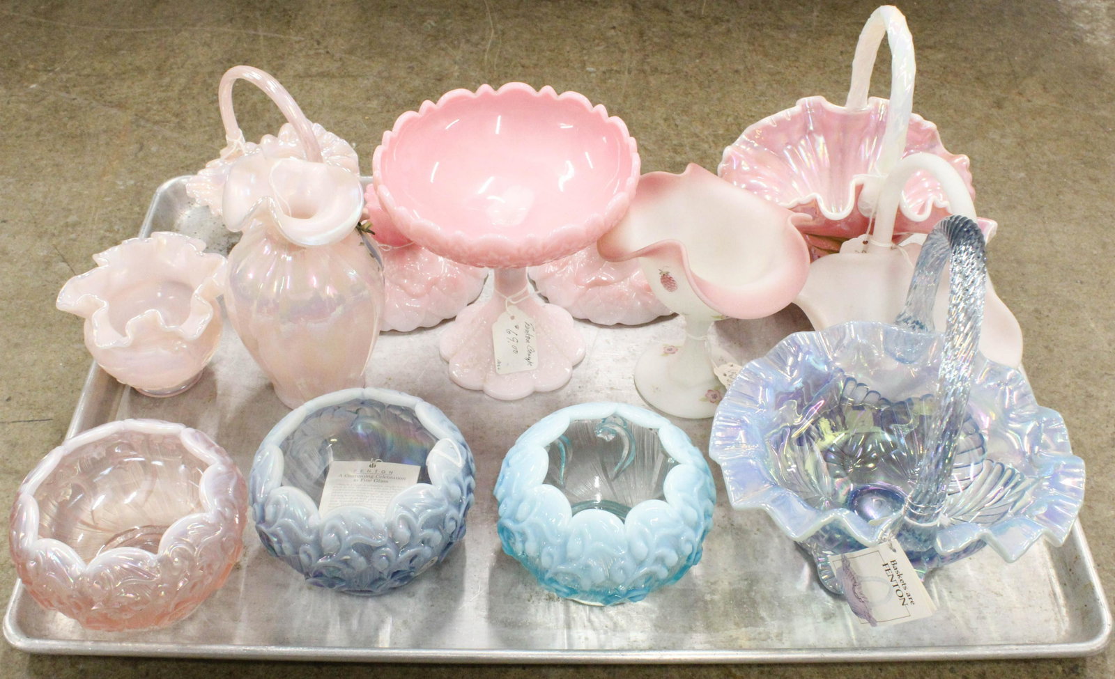 Group of 13 Fenton Art Glass Tableware Items: Group of 13 Fenton Art Glass Tableware Items including 3 rose bowls, 3 iridescent baskets, pink Rosalene compote and pair of candlesticks, two satin pieces, some with hand painted decoration ht 4"-10"