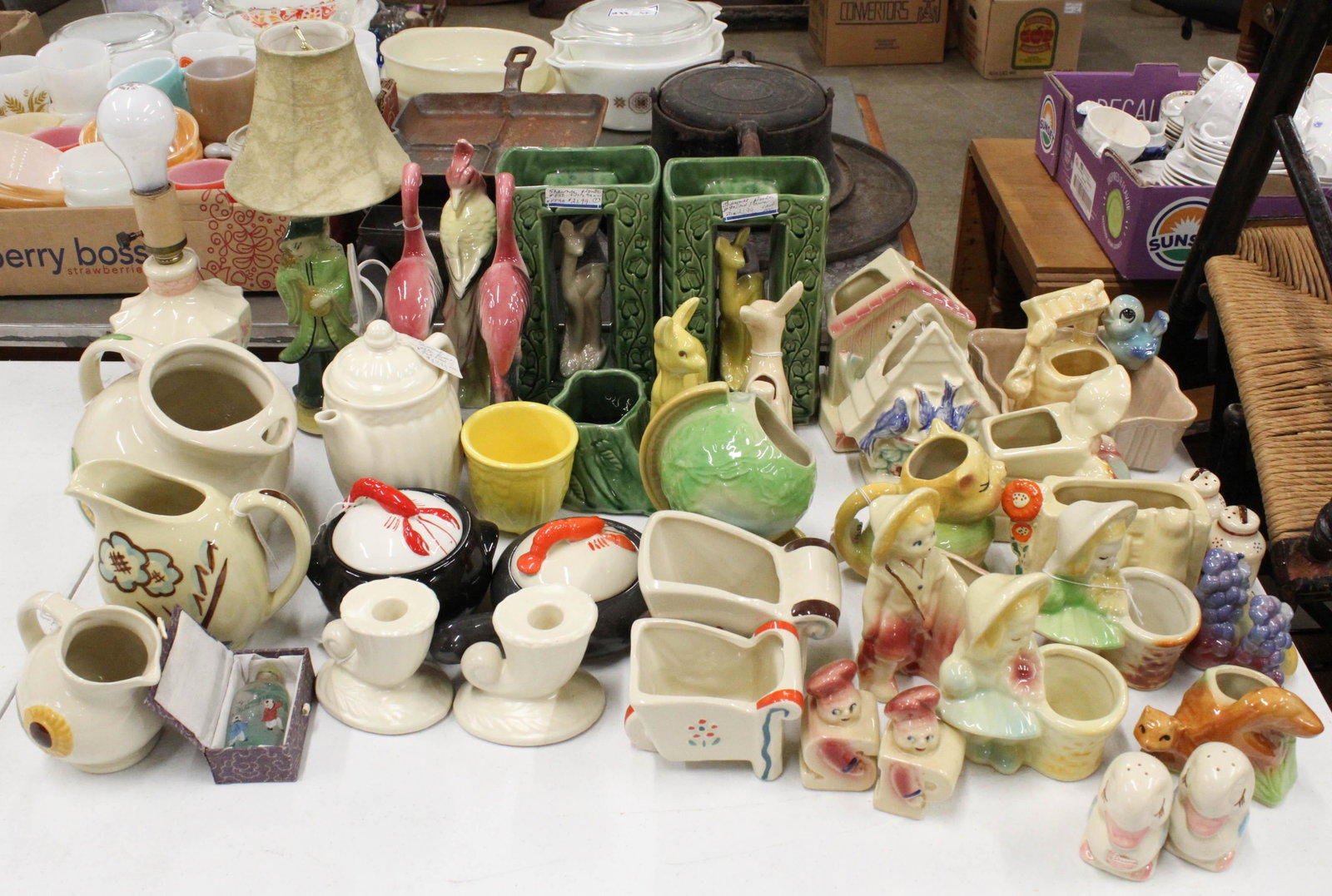 41 pcs. Shawnee and American Pottery Items: Large 41 pcs. Shawnee and American Ohio Art Pottery Items including lamps, planters, salt and pepper shakers, pitchers, etc.