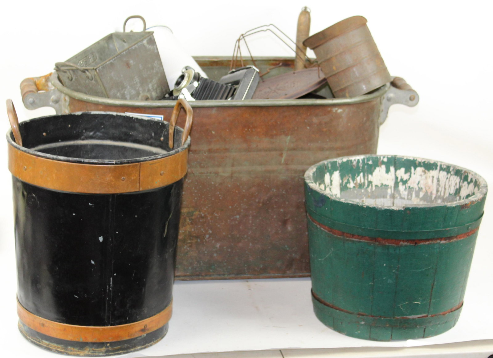 Lot of Country Primitives: Lot including Green painted sap bucket, copper wash tub, pulley block, butter churn, folding kodak camera, wrought iron kettle stand, toaster etc.