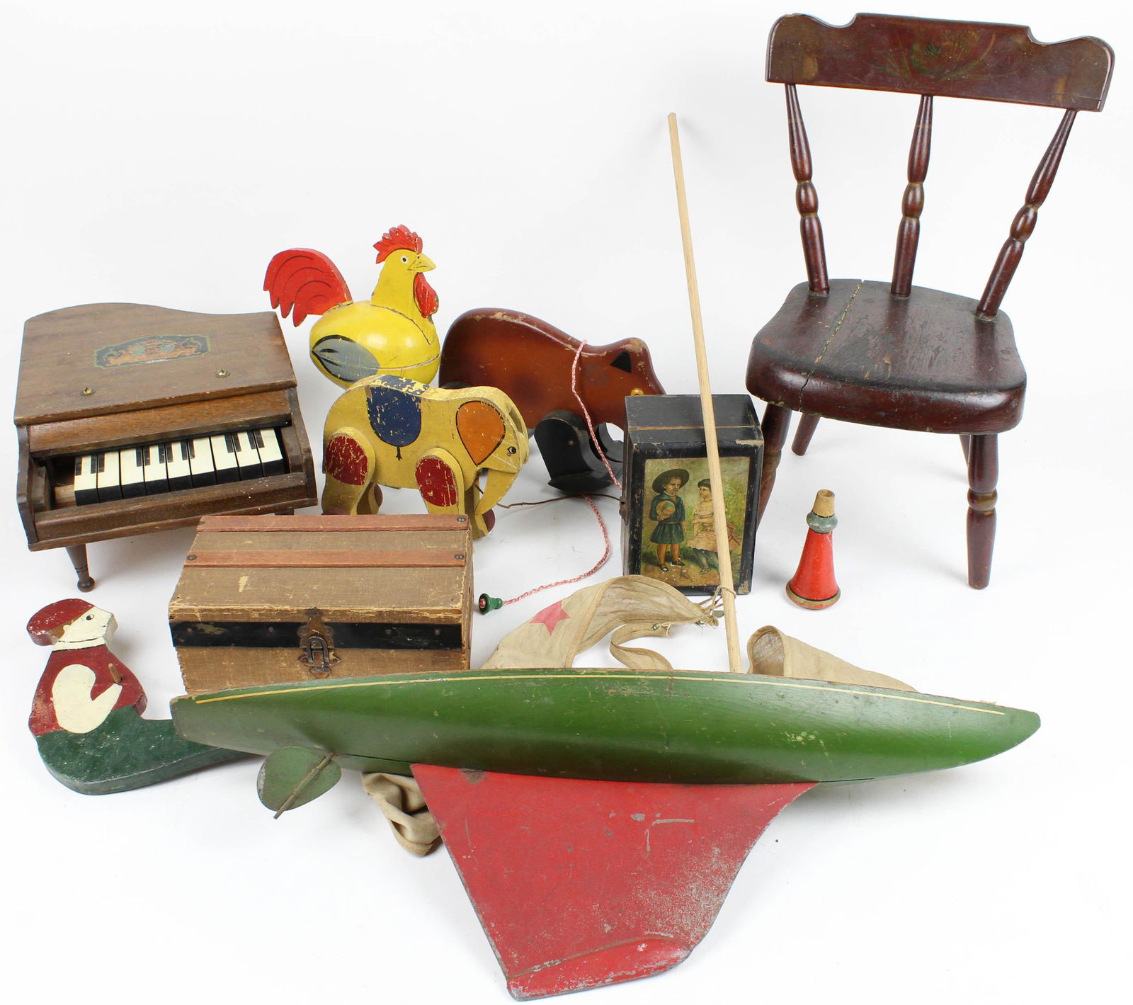 Lot of Antique Wooden Toys Incl. Pond Boat: Lot of Antique Wooden Toys Including Pond Boat, piano (as found), miniature steamer doll trunk, Windsor style chair, pull toys, etc.